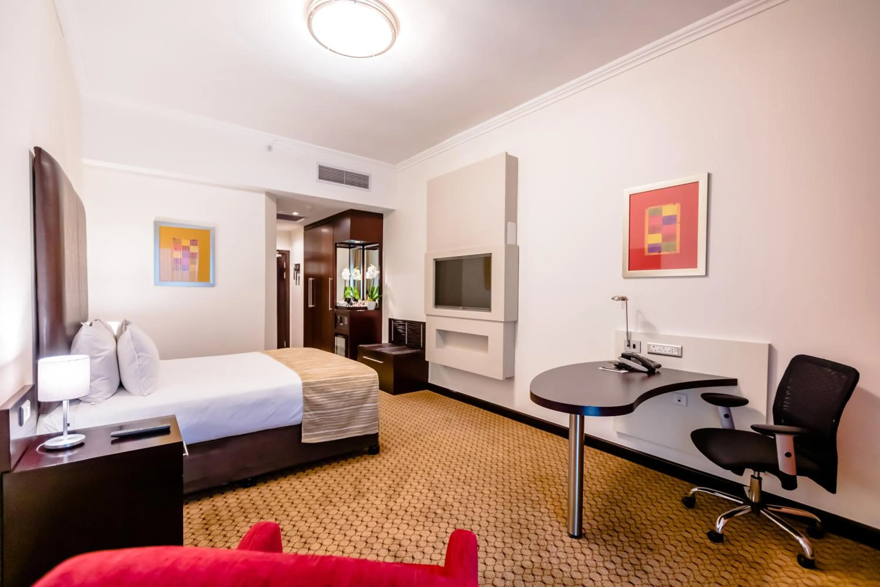 Bed in Holiday Inn Sandton, an IHG Hotel