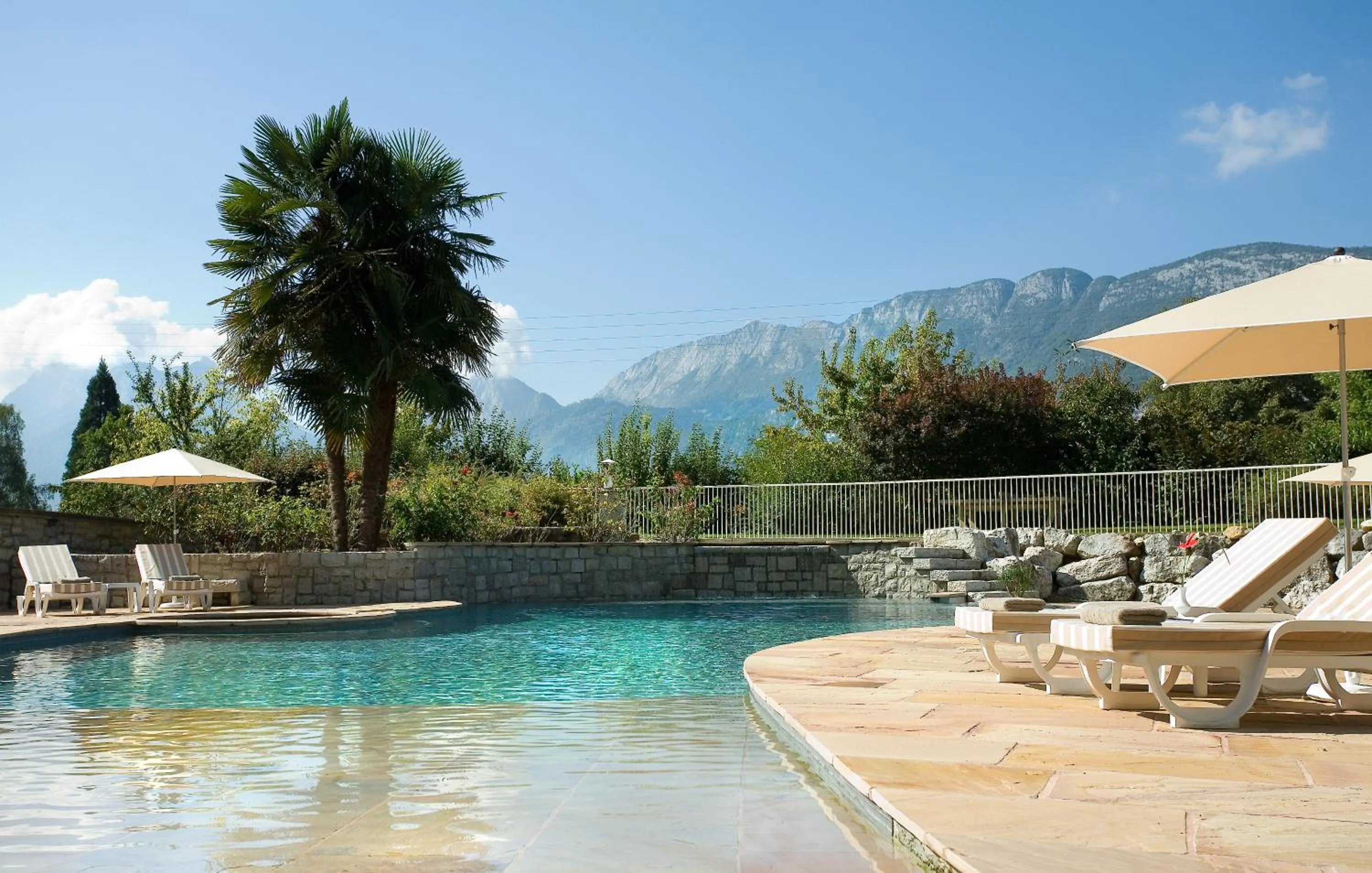 Swimming pool in Hôtel Les Grillons