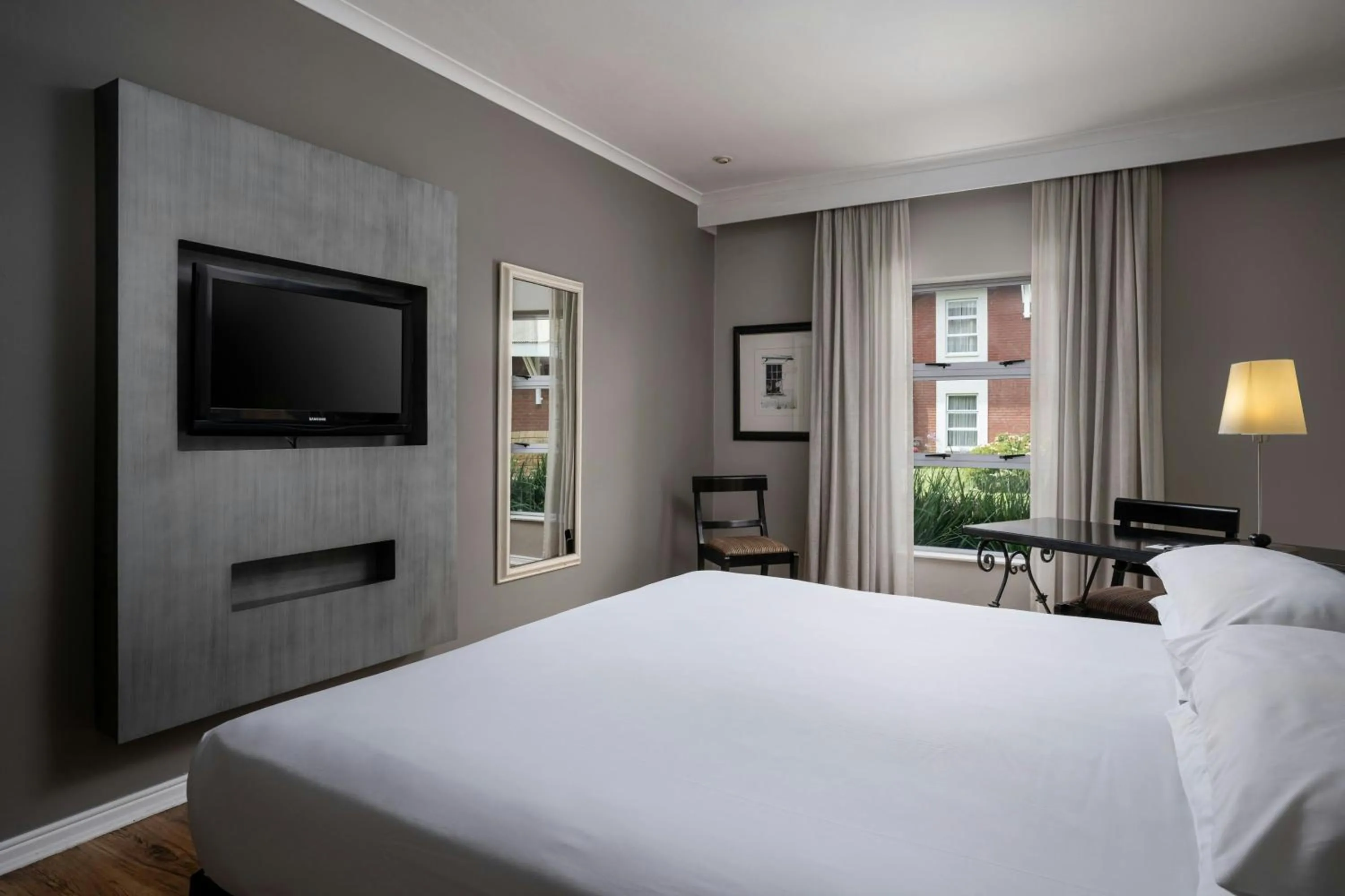 Photo of the whole room, Bed in Protea Hotel by Marriott Bloemfontein