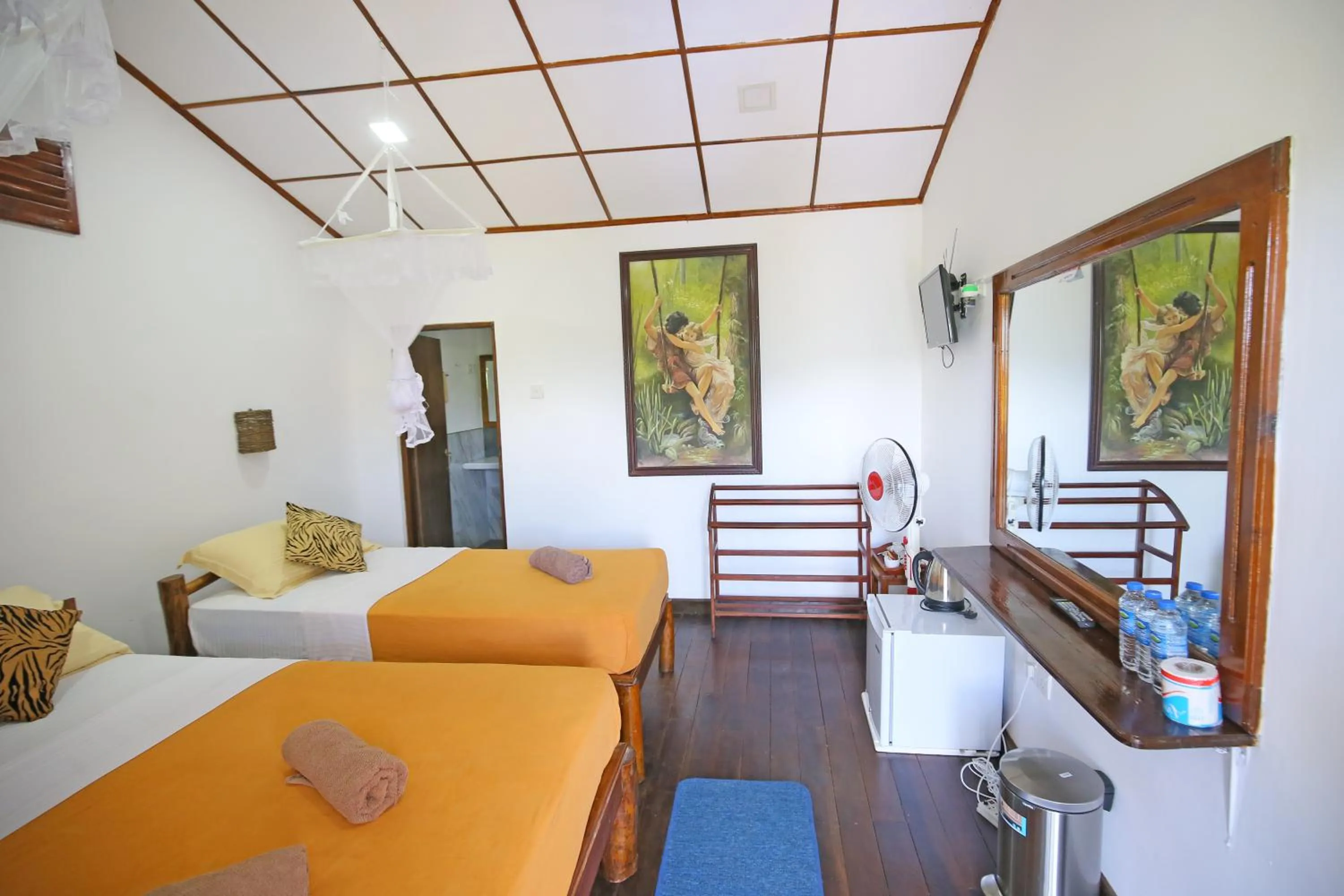 Bed in Ella Rawana Den Hotel