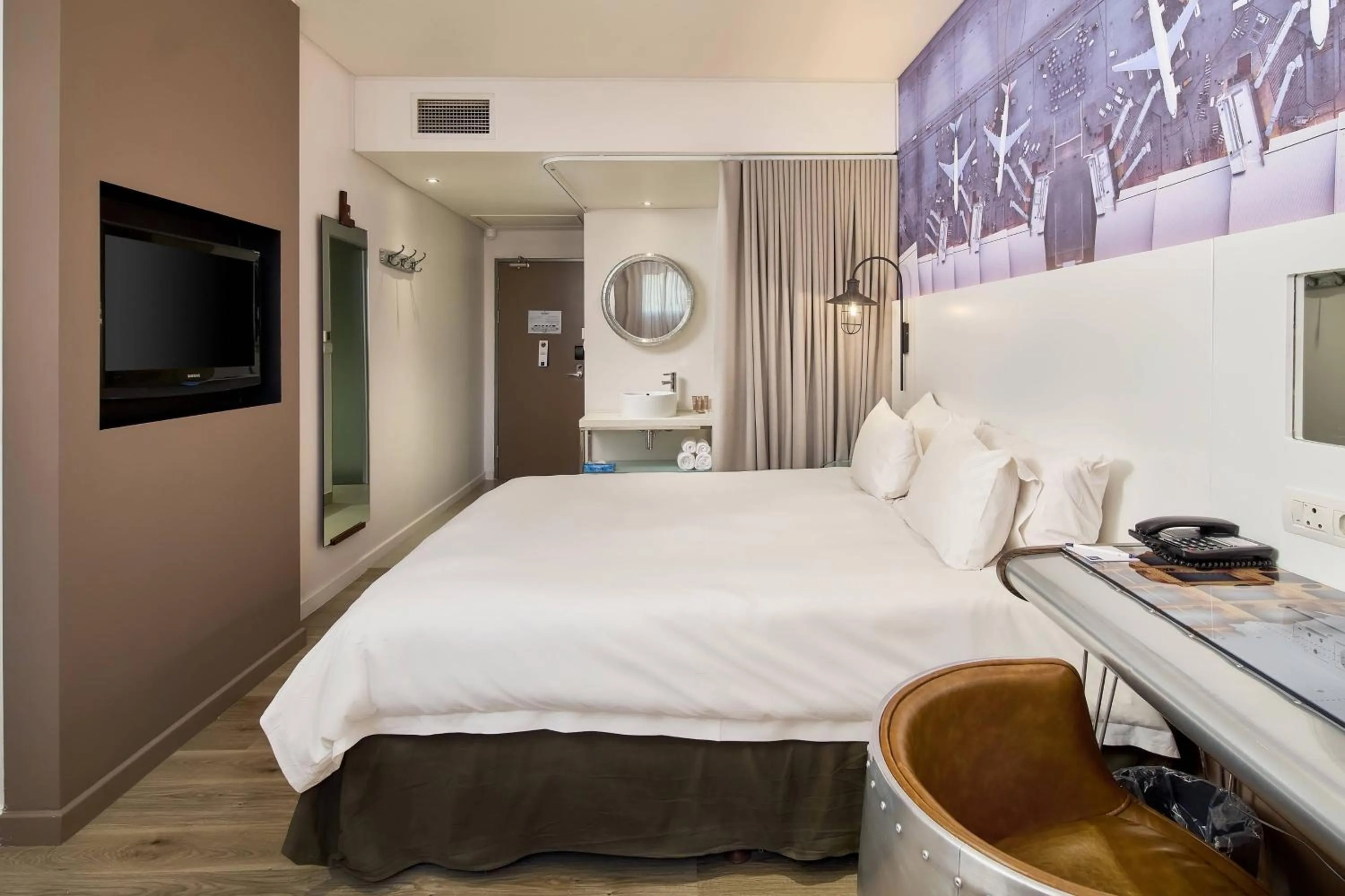 Photo of the whole room, Bed in Protea Hotel by Marriott O R Tambo Airport