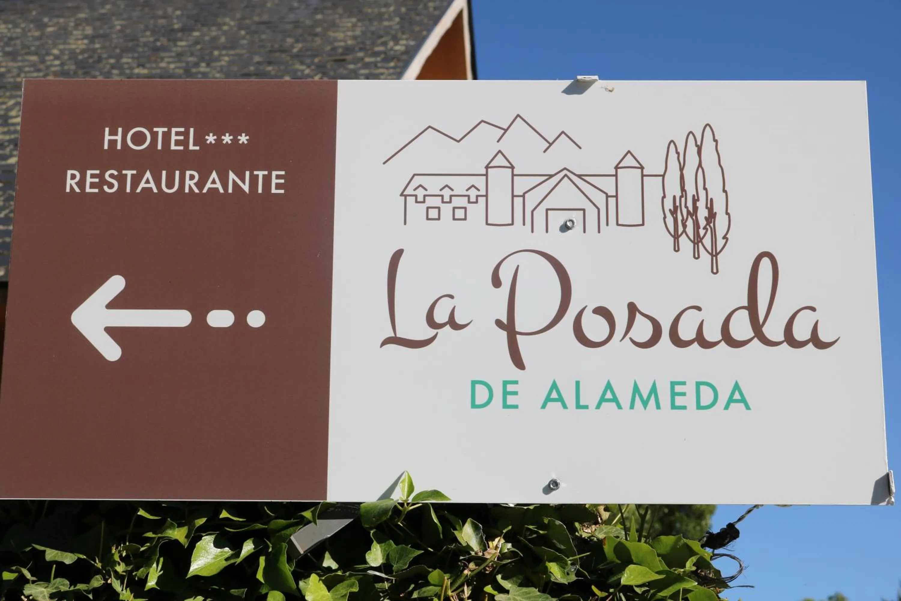 Property logo or sign in Hotel La Posada De Alameda