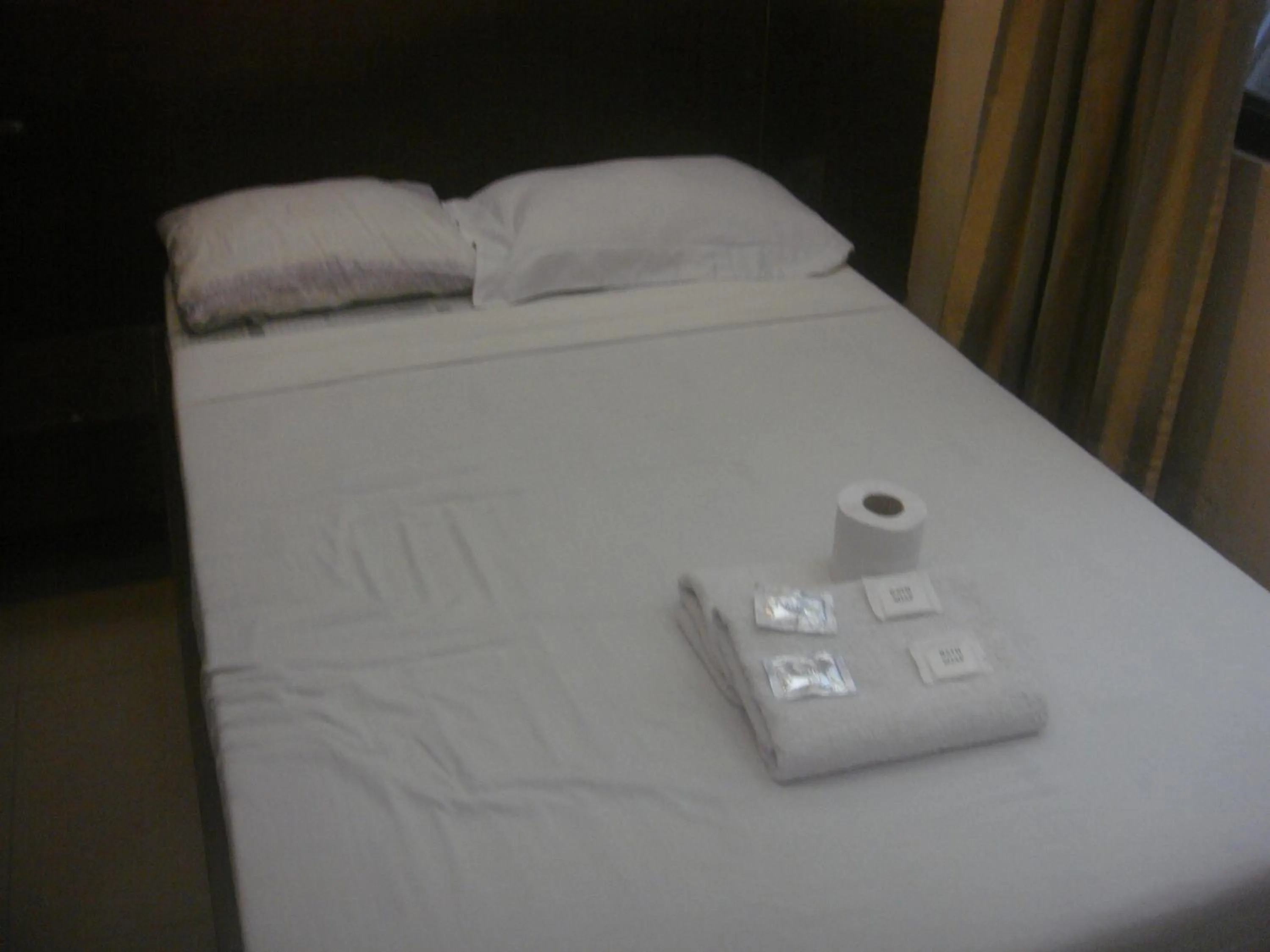 Bed in Hidden Pearl Hotel (Janus Luxury Suites)