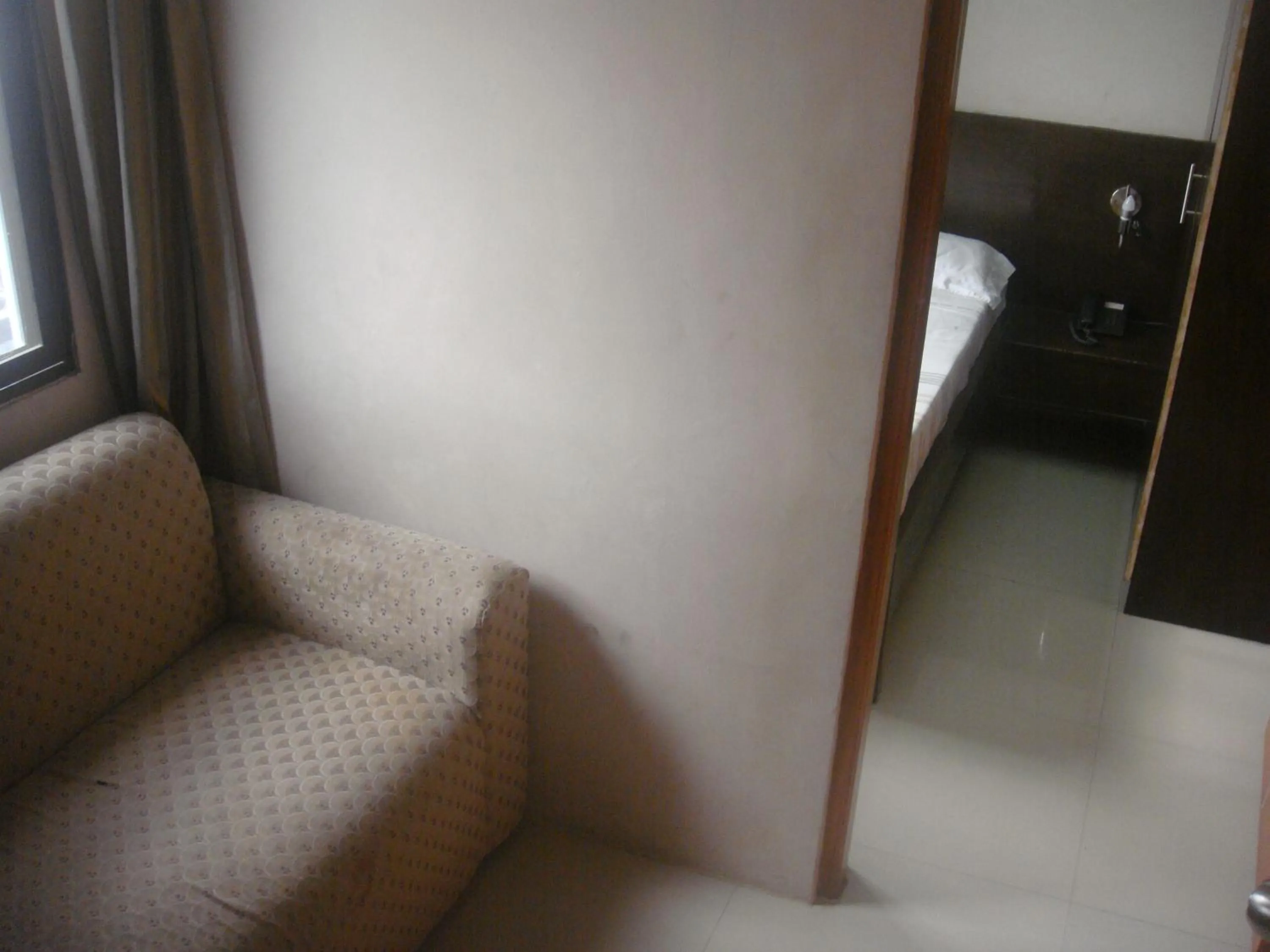 Seating area in Hidden Pearl Hotel (Janus Luxury Suites)