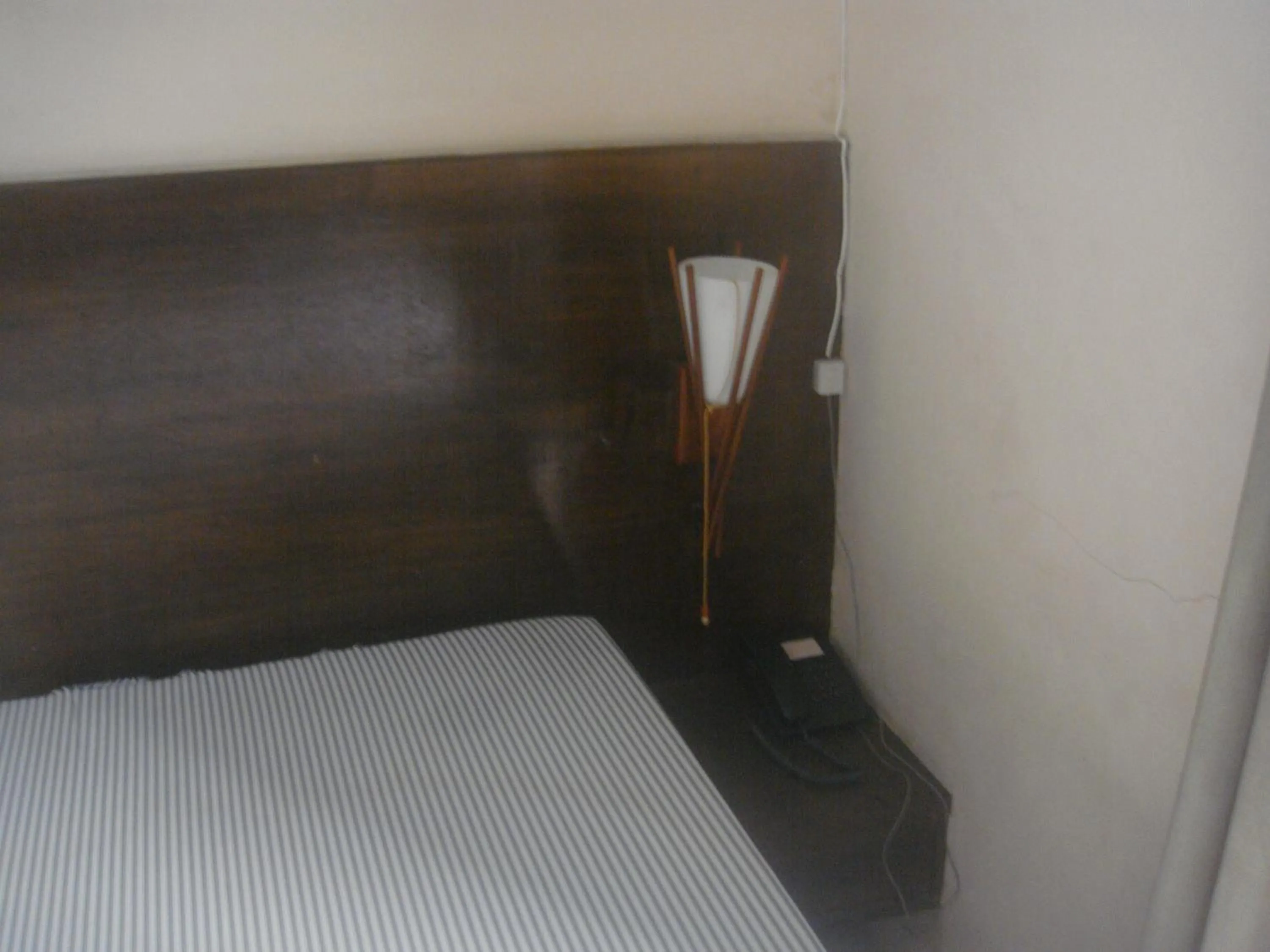 Decorative detail, Bed in Hidden Pearl Hotel (Janus Luxury Suites)