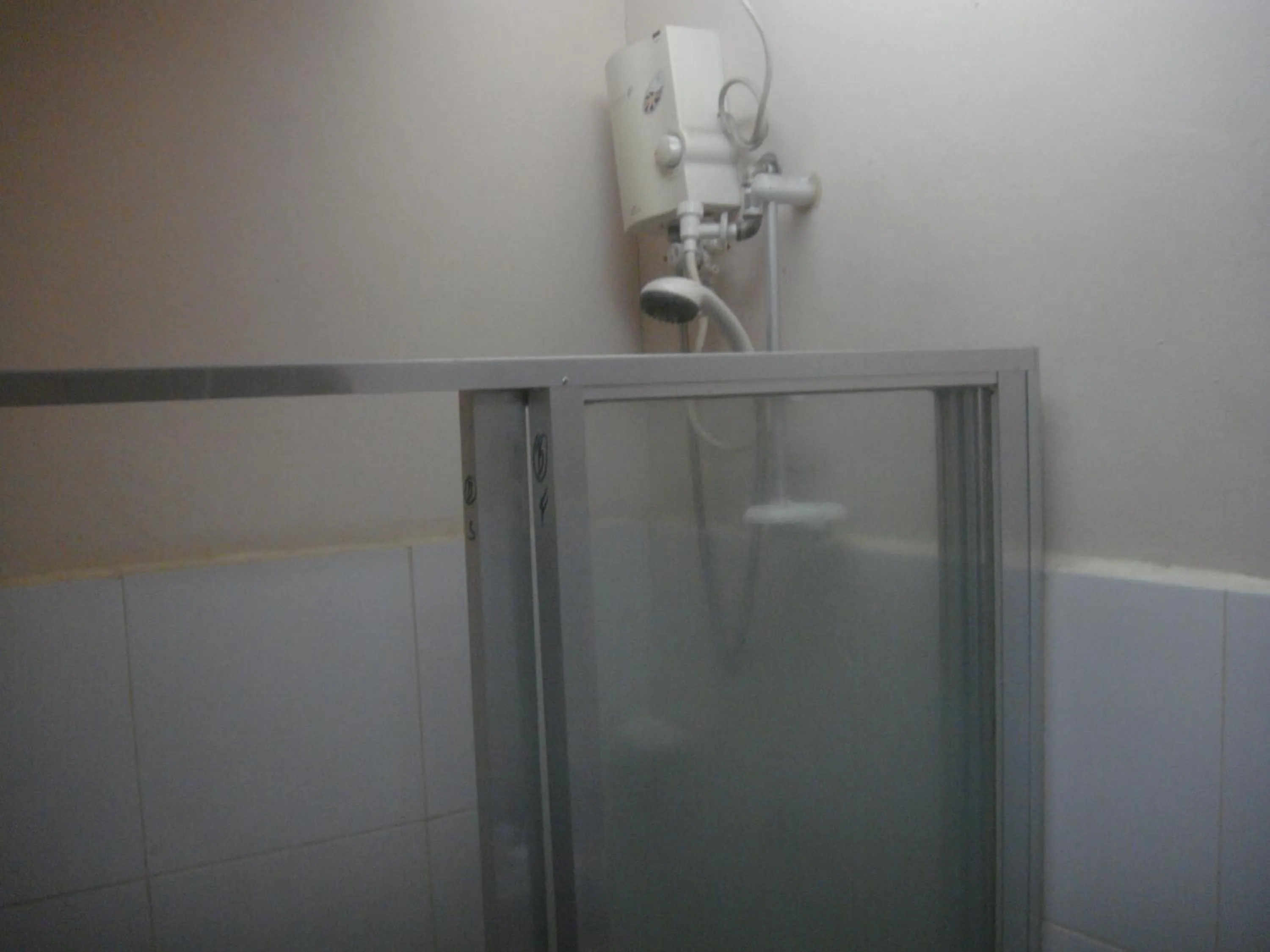 Shower in Hidden Pearl Hotel (Janus Luxury Suites)
