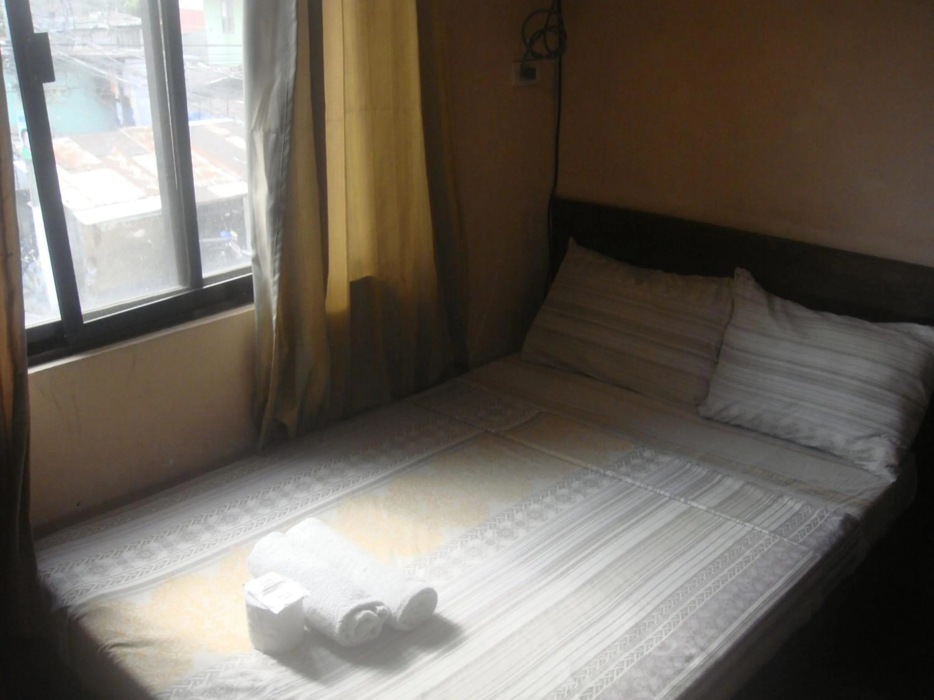 Bed in Hidden Pearl Hotel (Janus Luxury Suites)