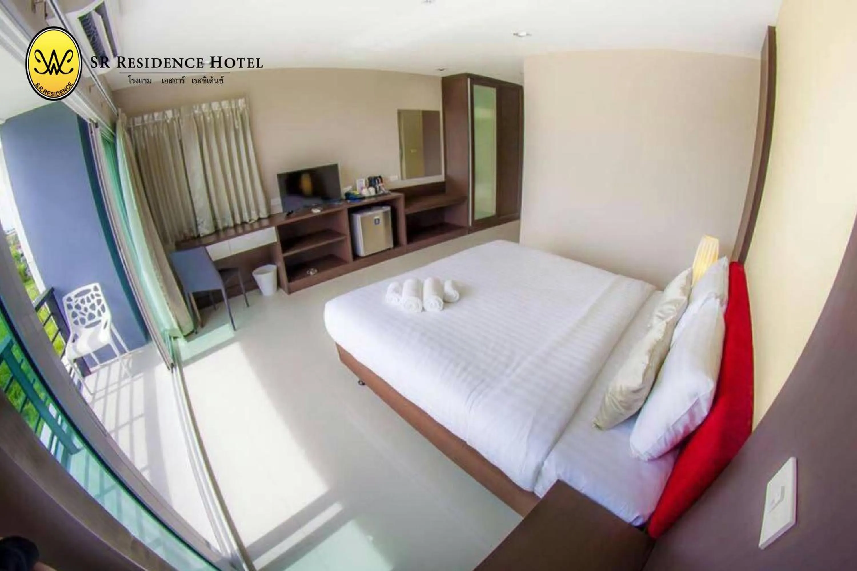 Bed in SR Residence Hotel