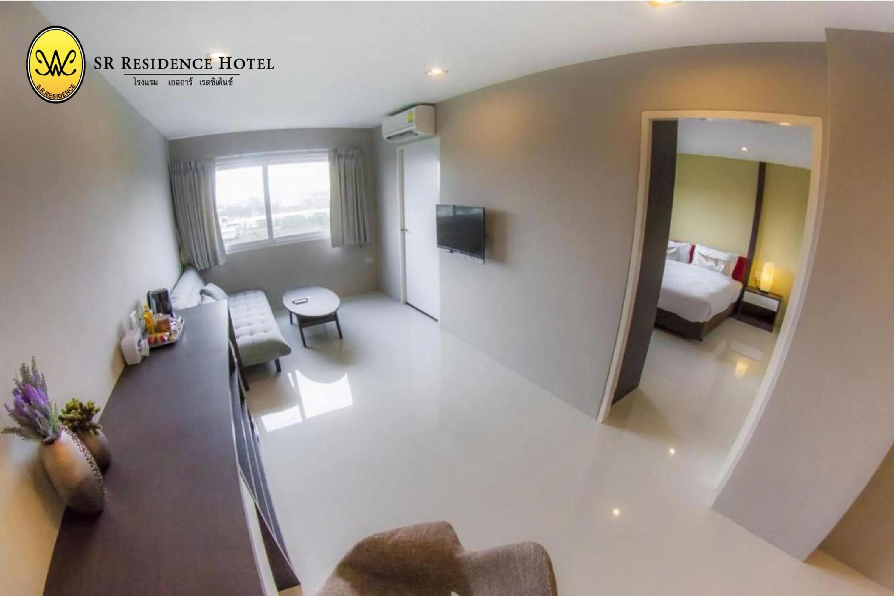 Living room, Bed in SR Residence Hotel