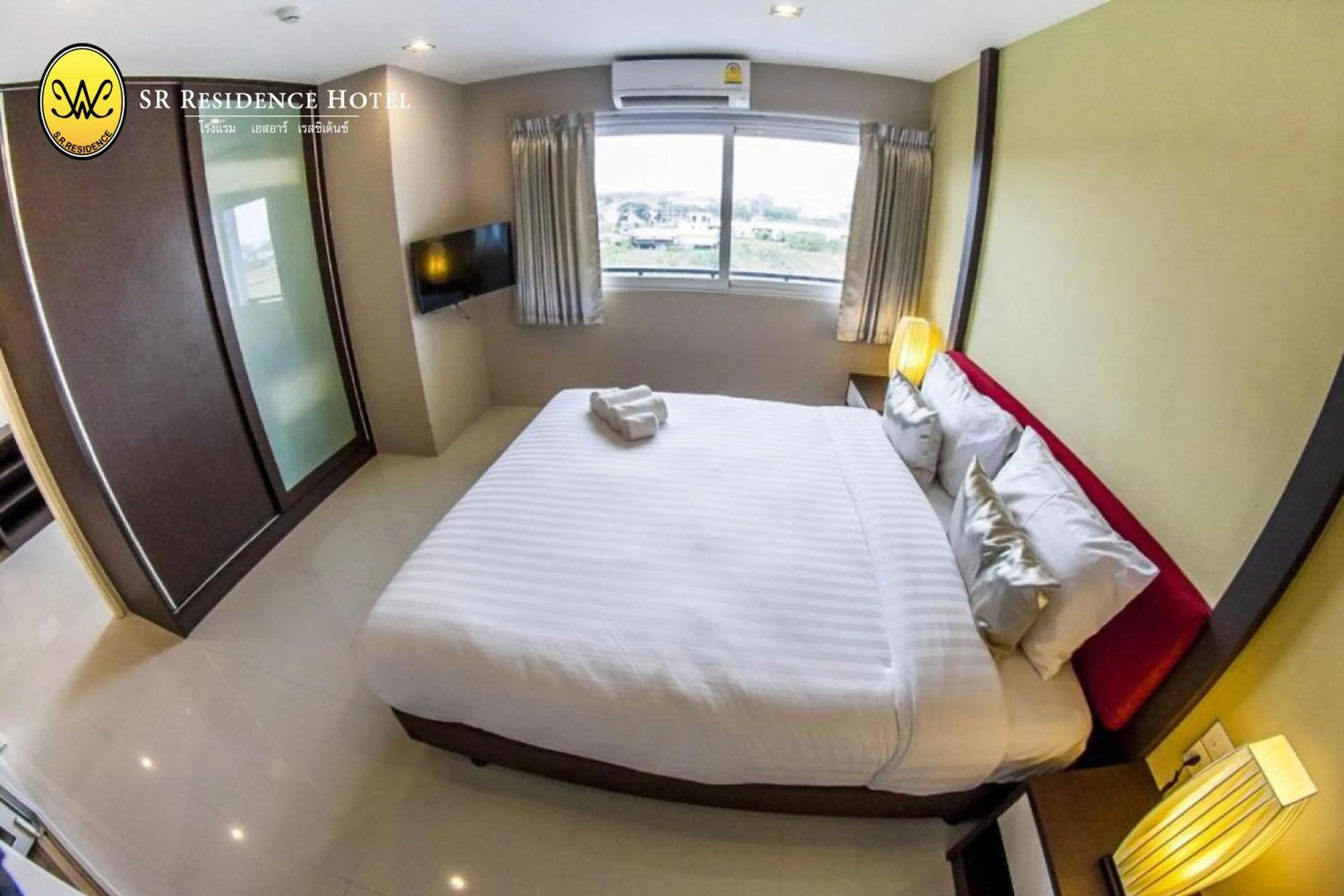 Bed in SR Residence Hotel