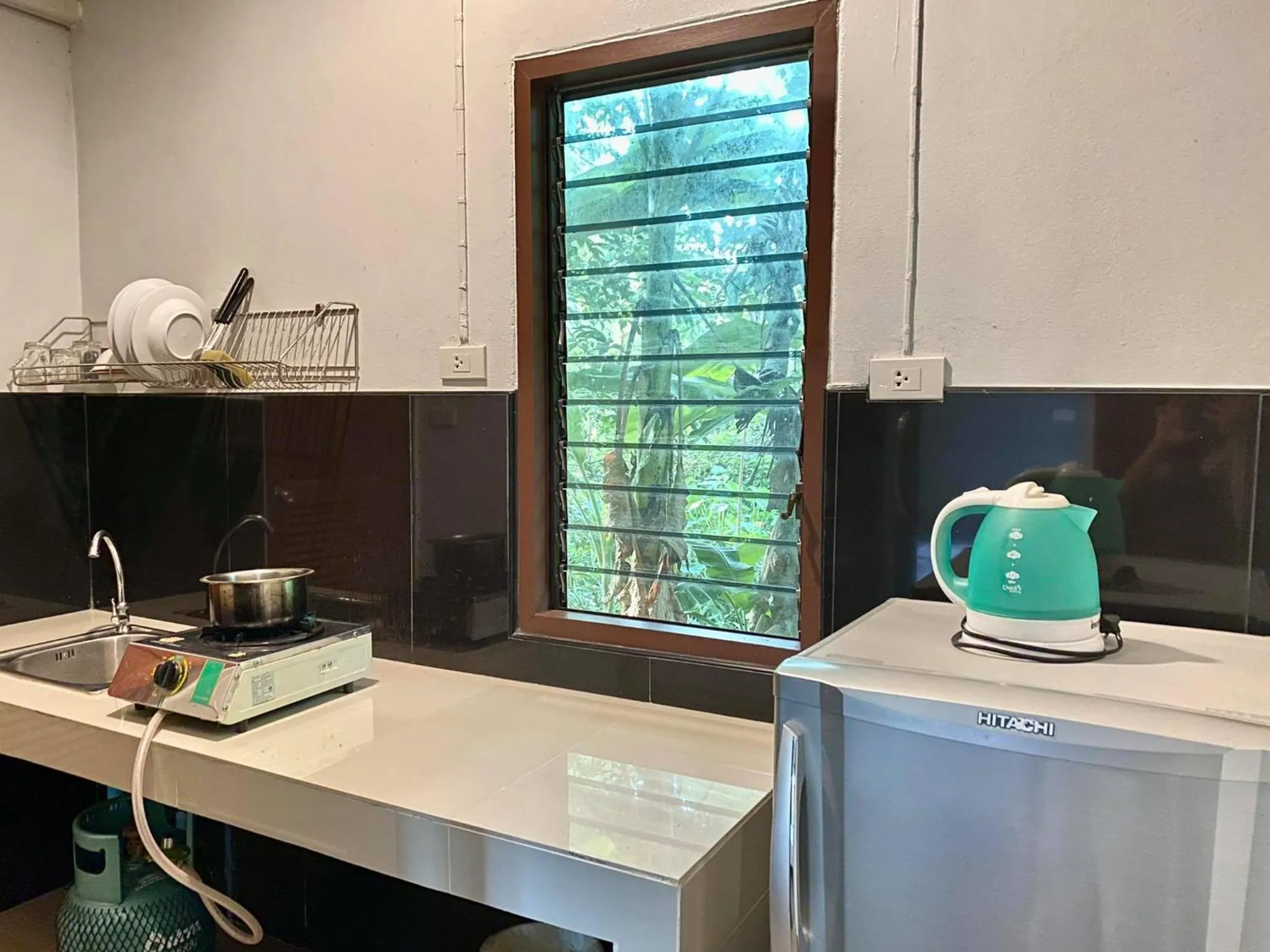 Kitchen or kitchenette in Coconut Bungalow