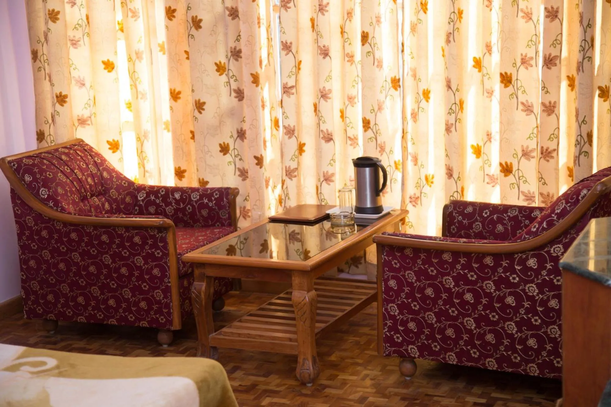 Seating area in Hotel Satkar Residency - Riverside Old Manali