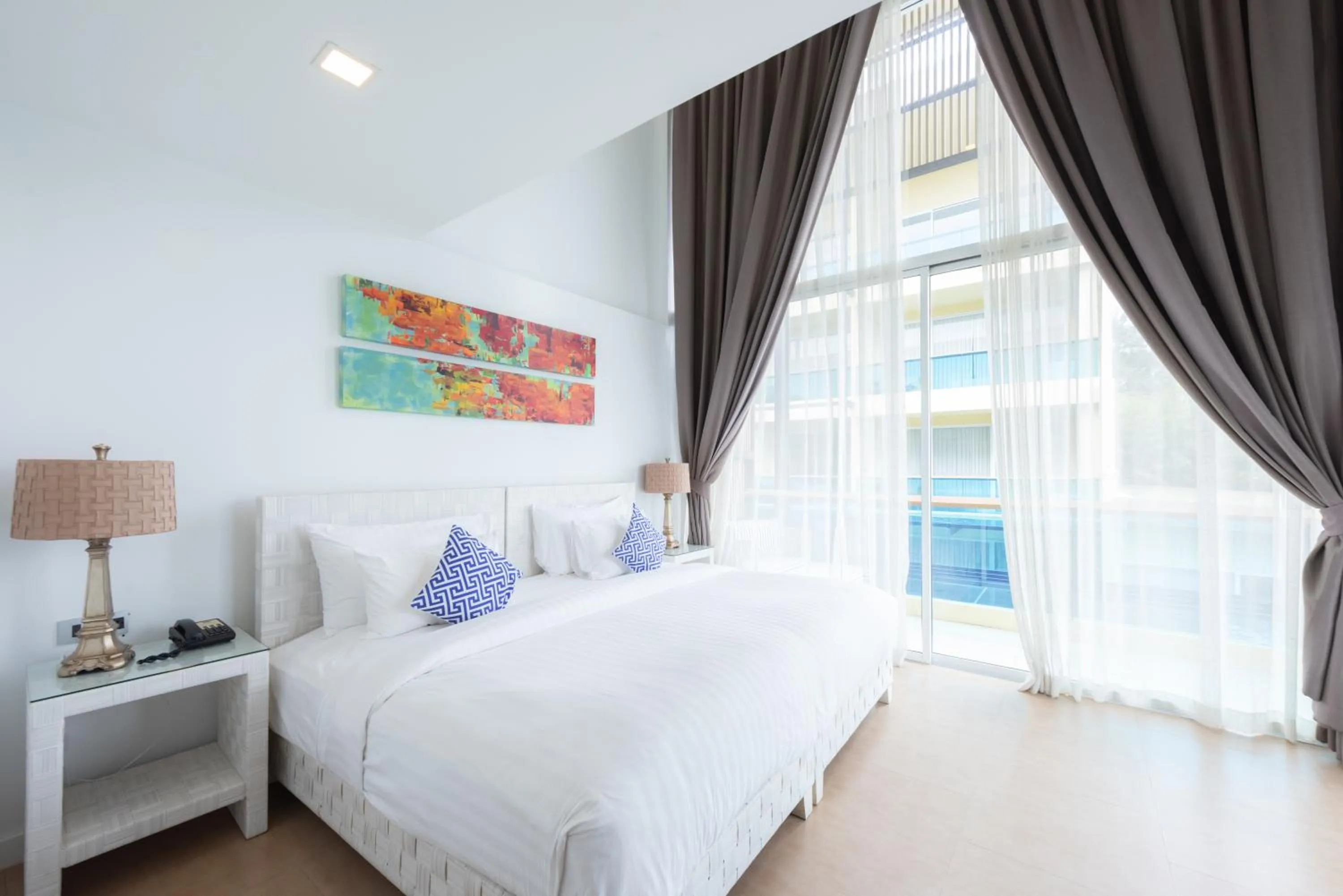 Bed in Beach Walk Boutique Resort