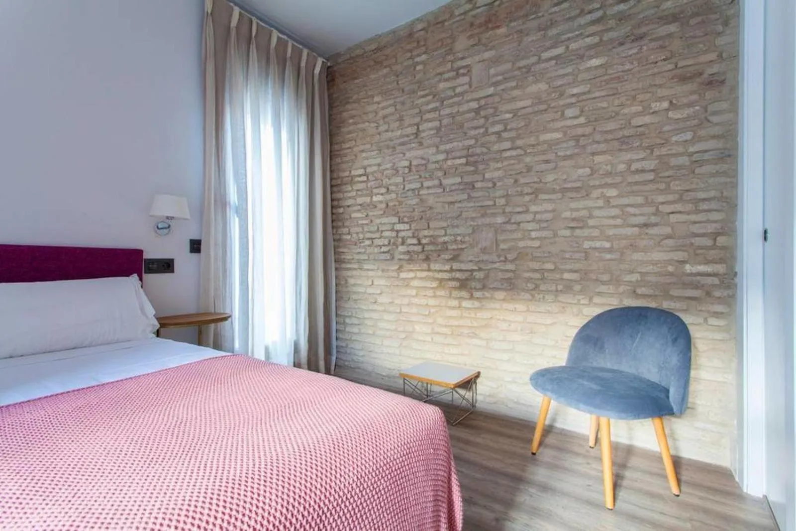 Bedroom, Bed in Apartamentos RG Dúplex San Bernardo