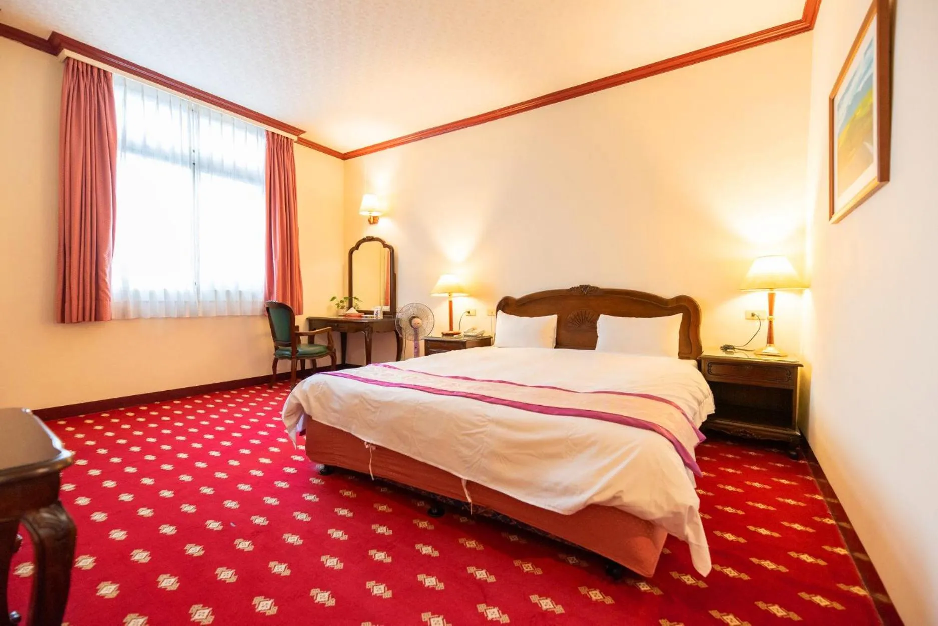 Bed in East Commercial Affairs Hotel