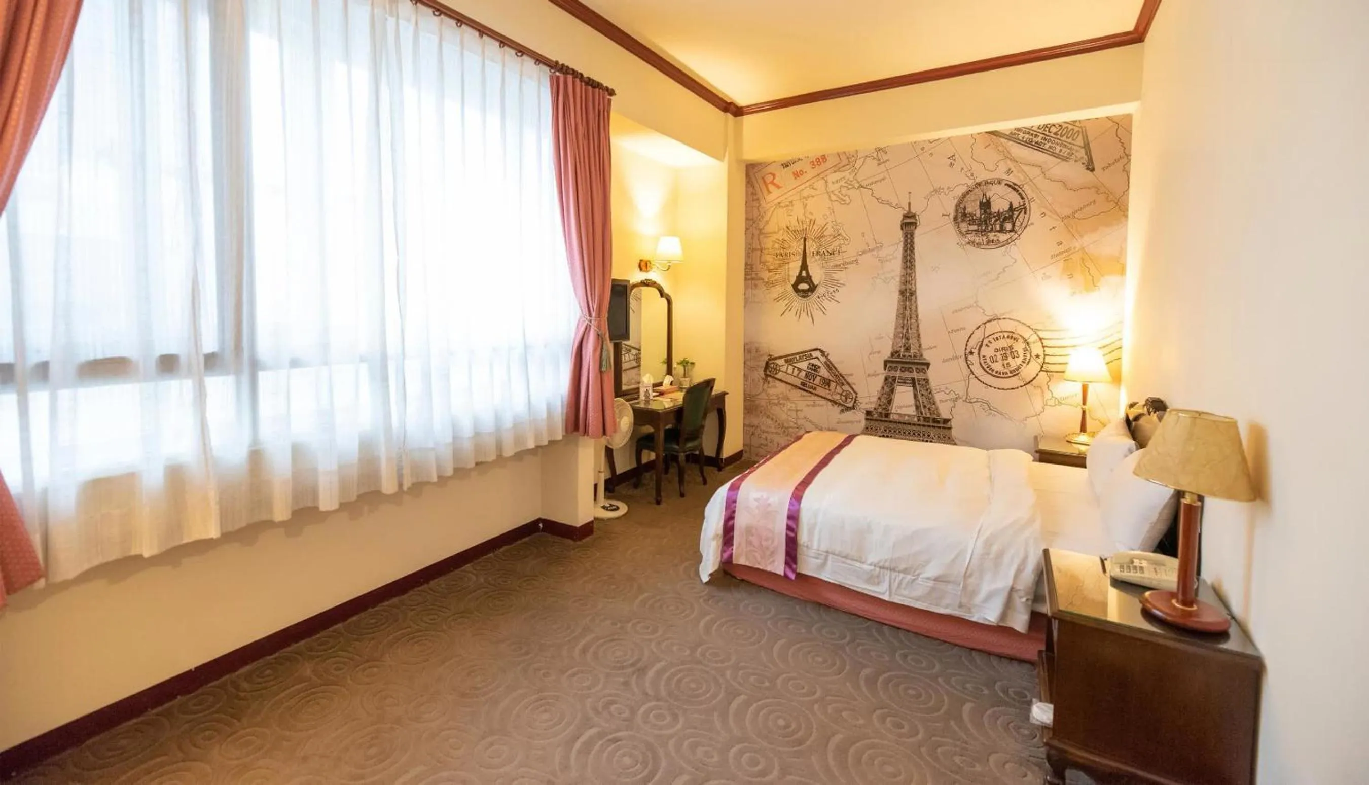 Bed in East Commercial Affairs Hotel