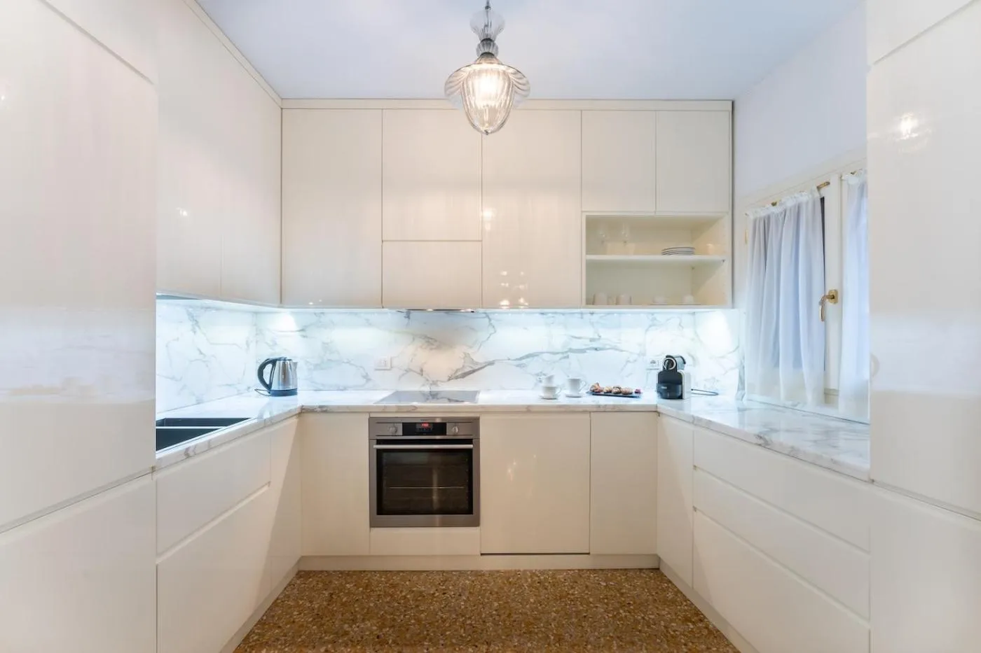 kitchen in San Teodoro Palace - Luxury Apartments