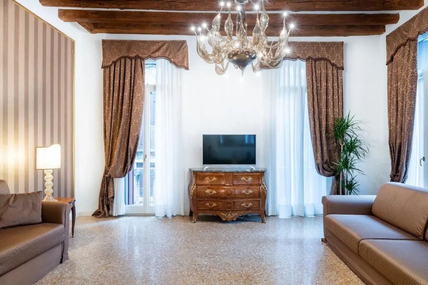 Living room in San Teodoro Palace - Luxury Apartments Living room in San Teodoro Palace - Luxury Apartments