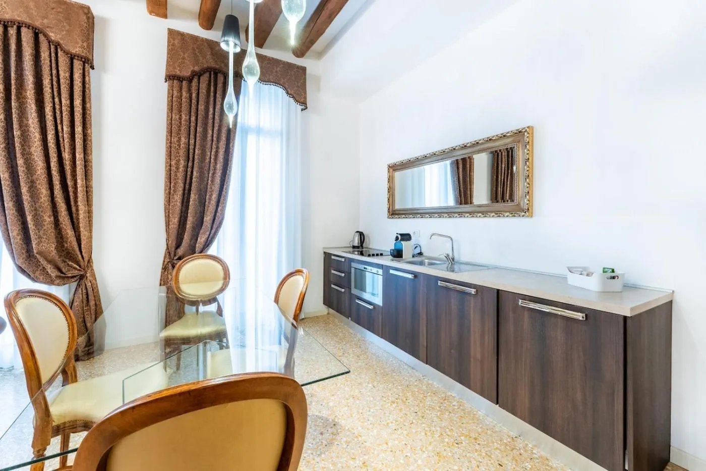 kitchen in San Teodoro Palace - Luxury Apartments