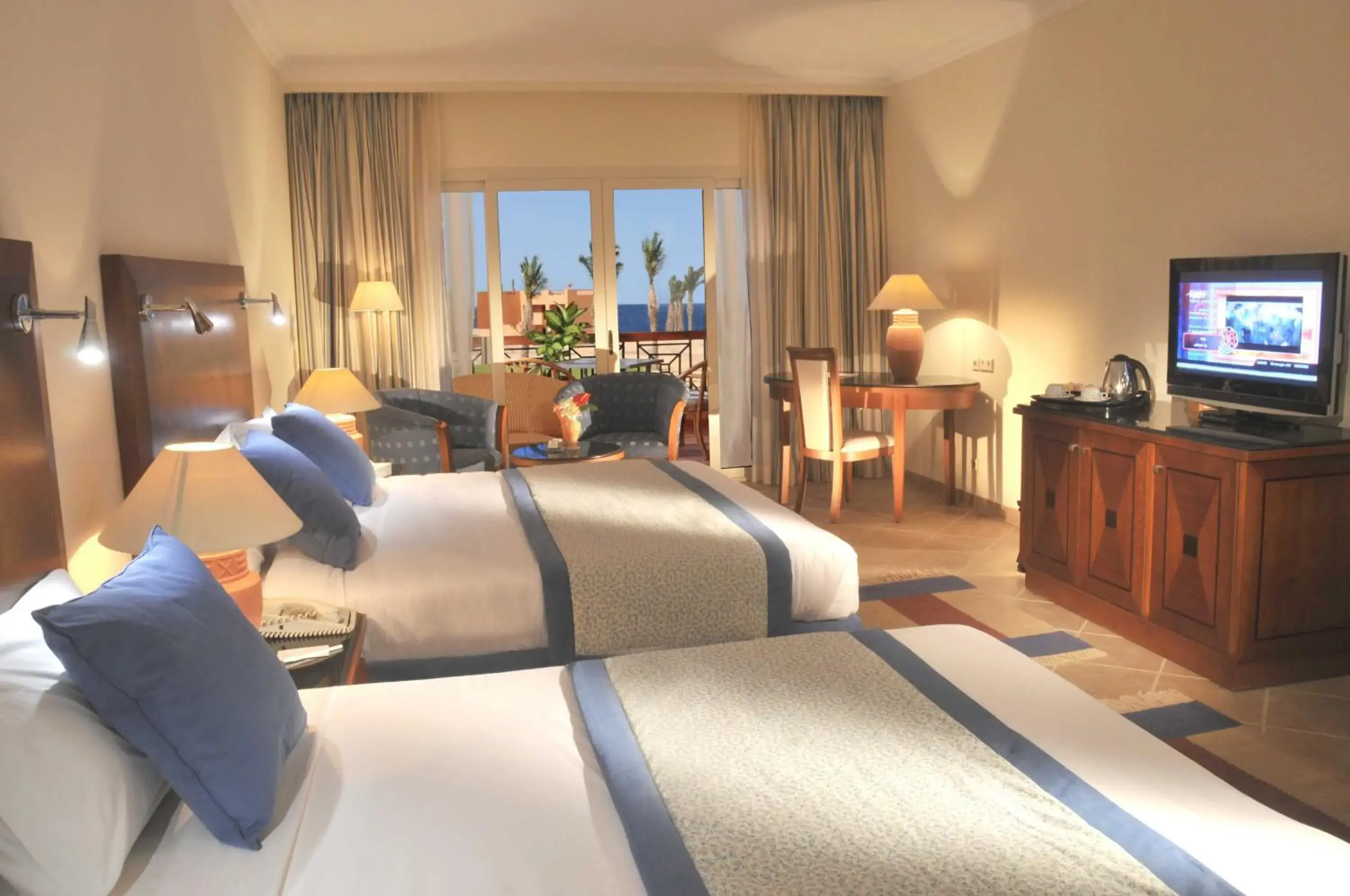 Coffee/tea facilities, Bed in JAZ Grand Marsa Coffee/tea facilities, Bed in JAZ Grand Marsa