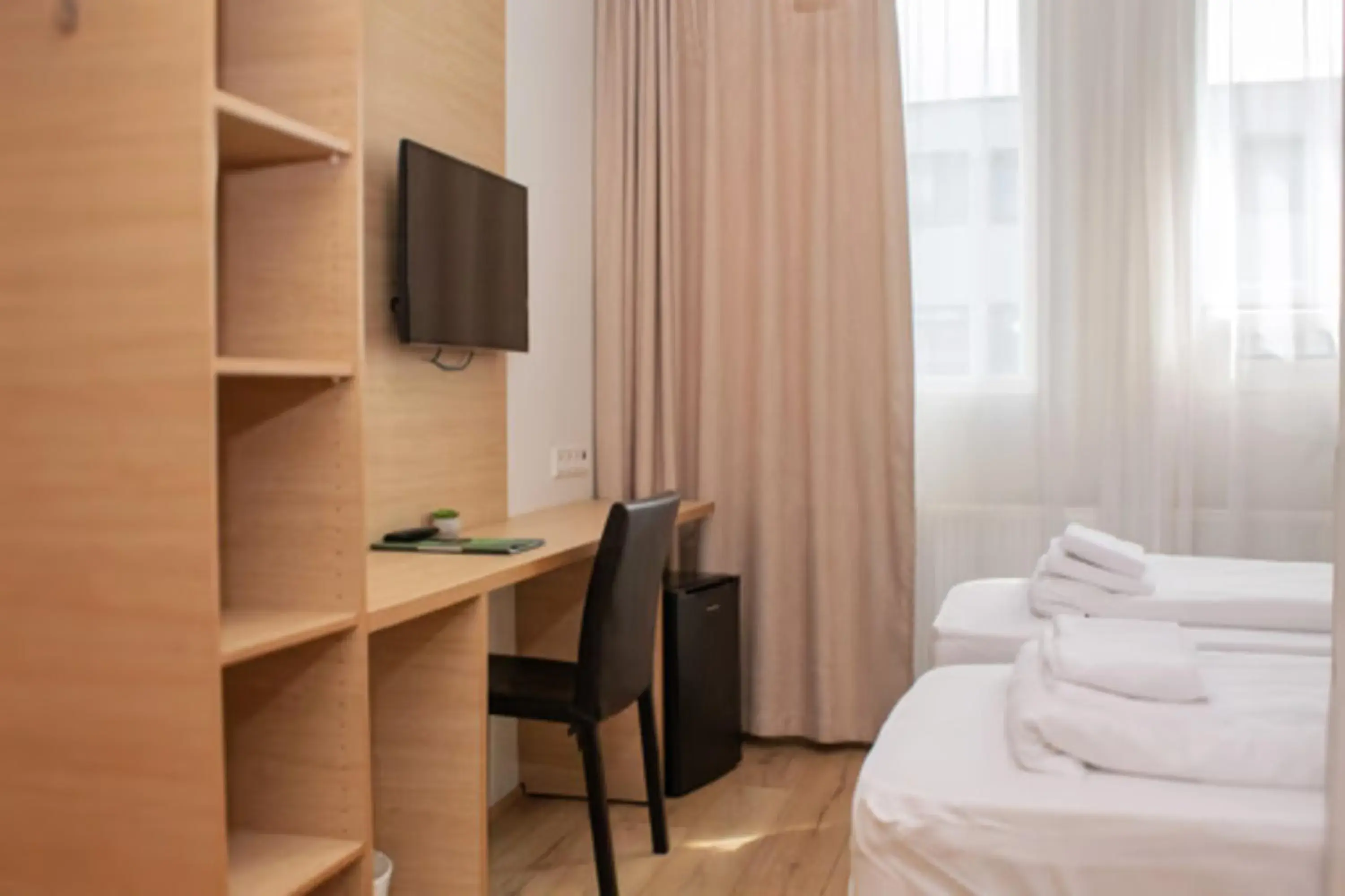 TV and multimedia, Bed in Hotel Muli TV and multimedia, Bed in Hotel Muli