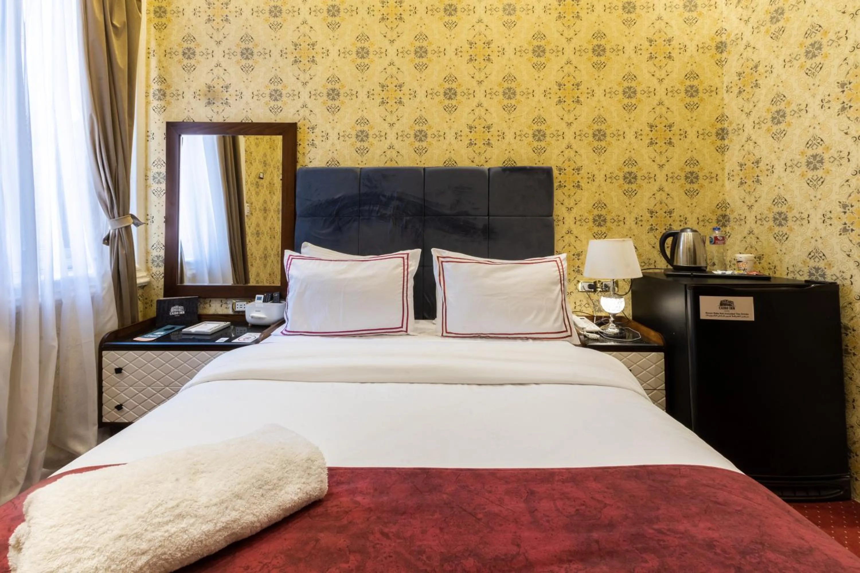 Photo of the whole room, Bed in Cairo Inn