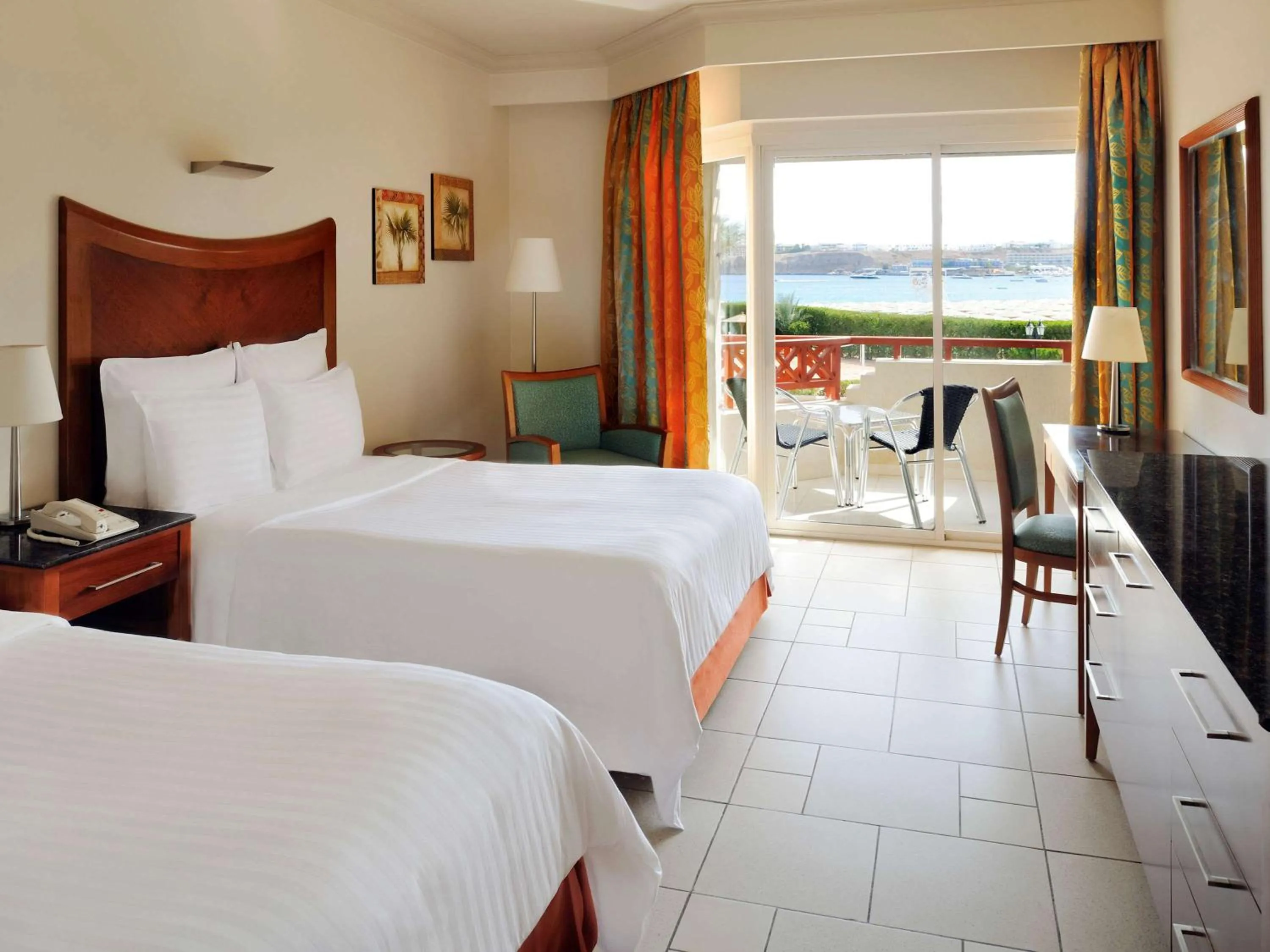 Deluxe Twin Room with Side Sea View - Beach Side in Naama Bay Promenade Beach Resort Managed By Accor