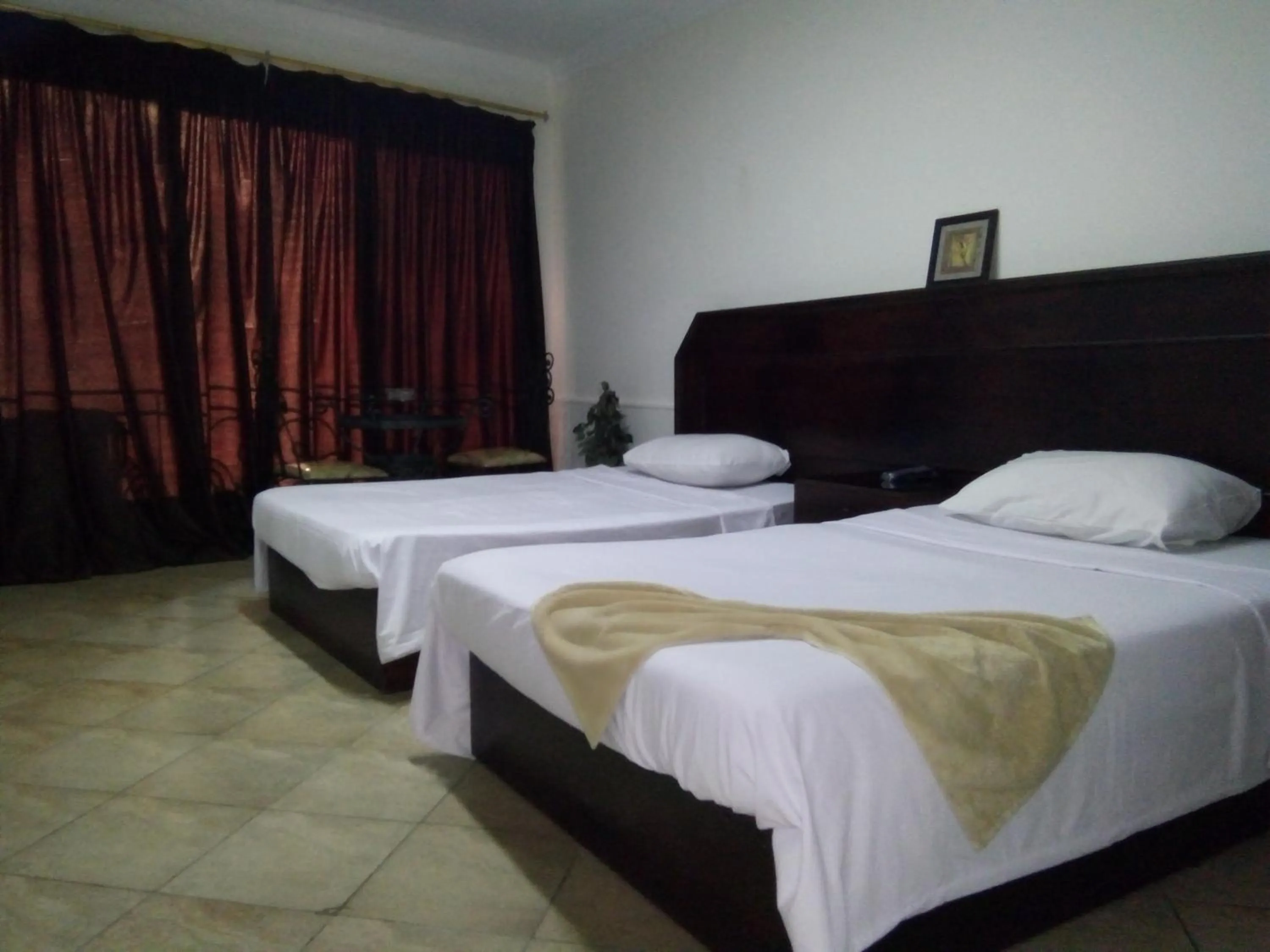 Bed in Arabesque Hotel