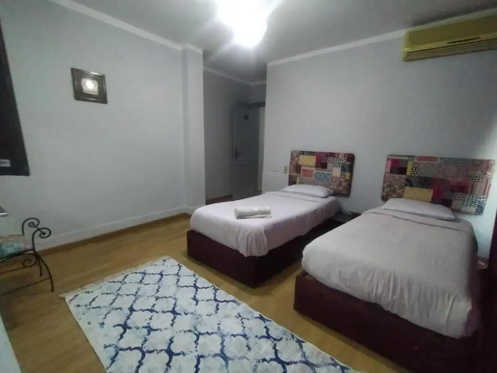 Bed in Arabesque Hotel