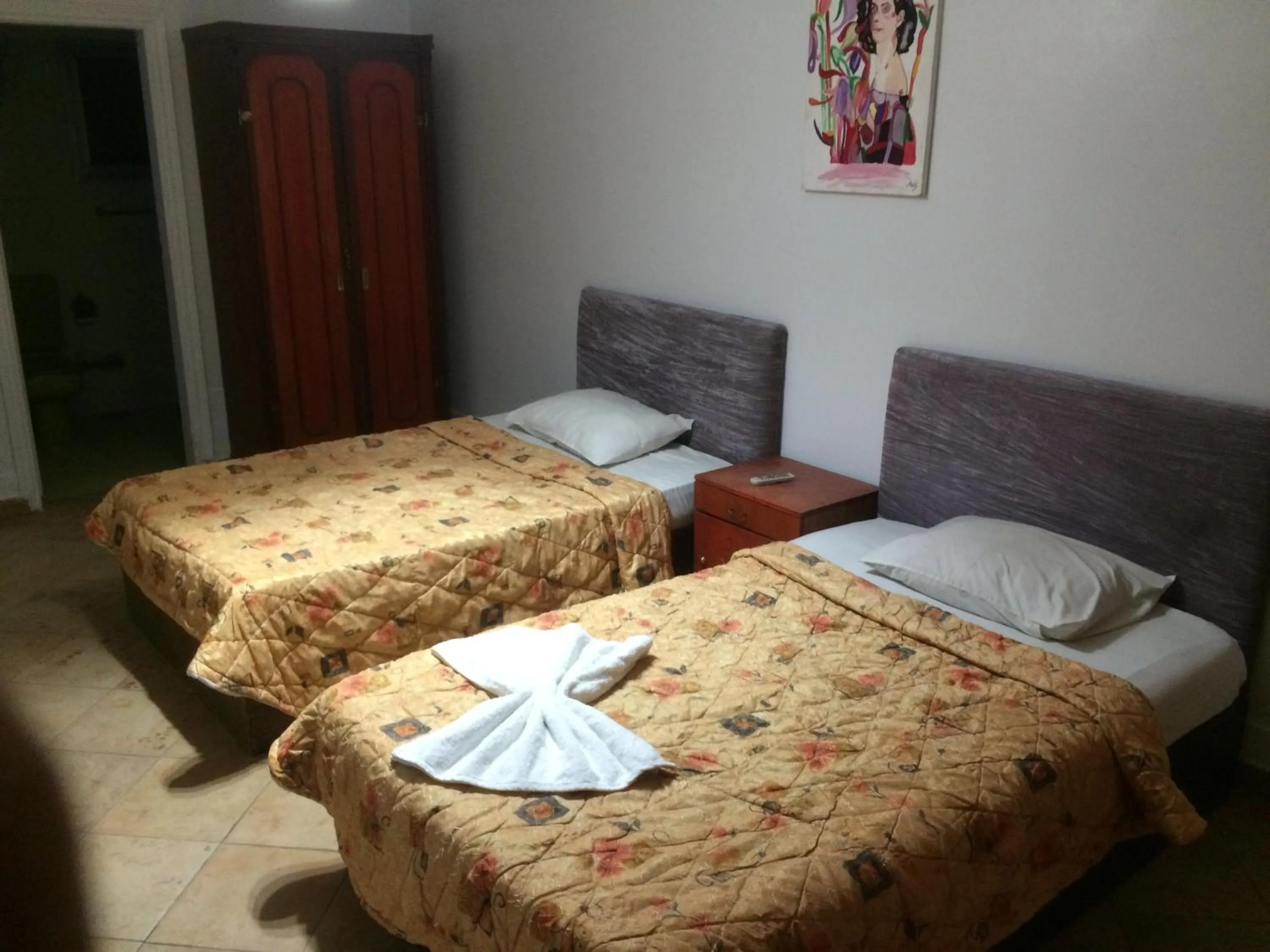 Bed in Arabesque Hotel