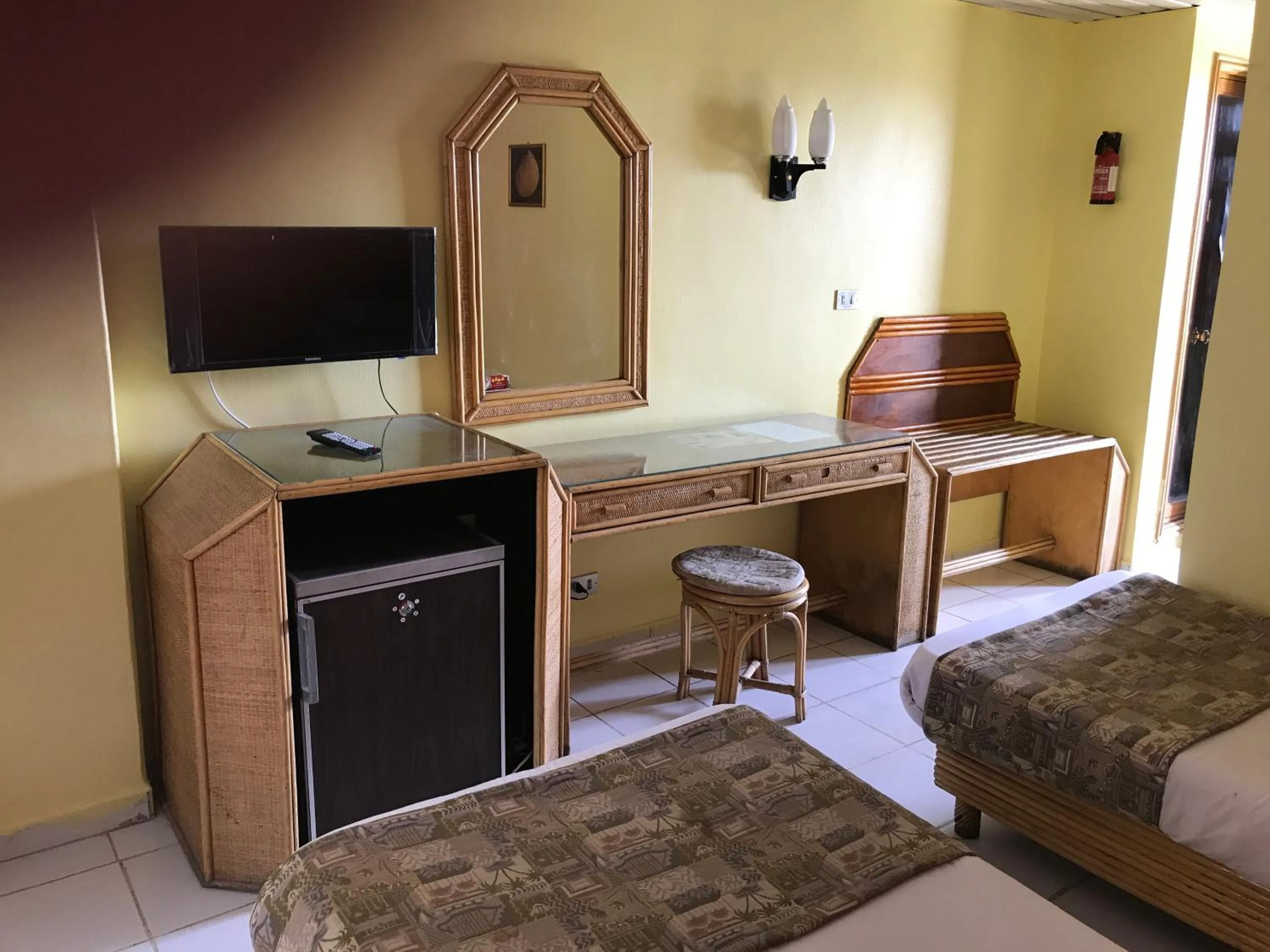 Bed in Gaddis Hotel, Suites and Apartments