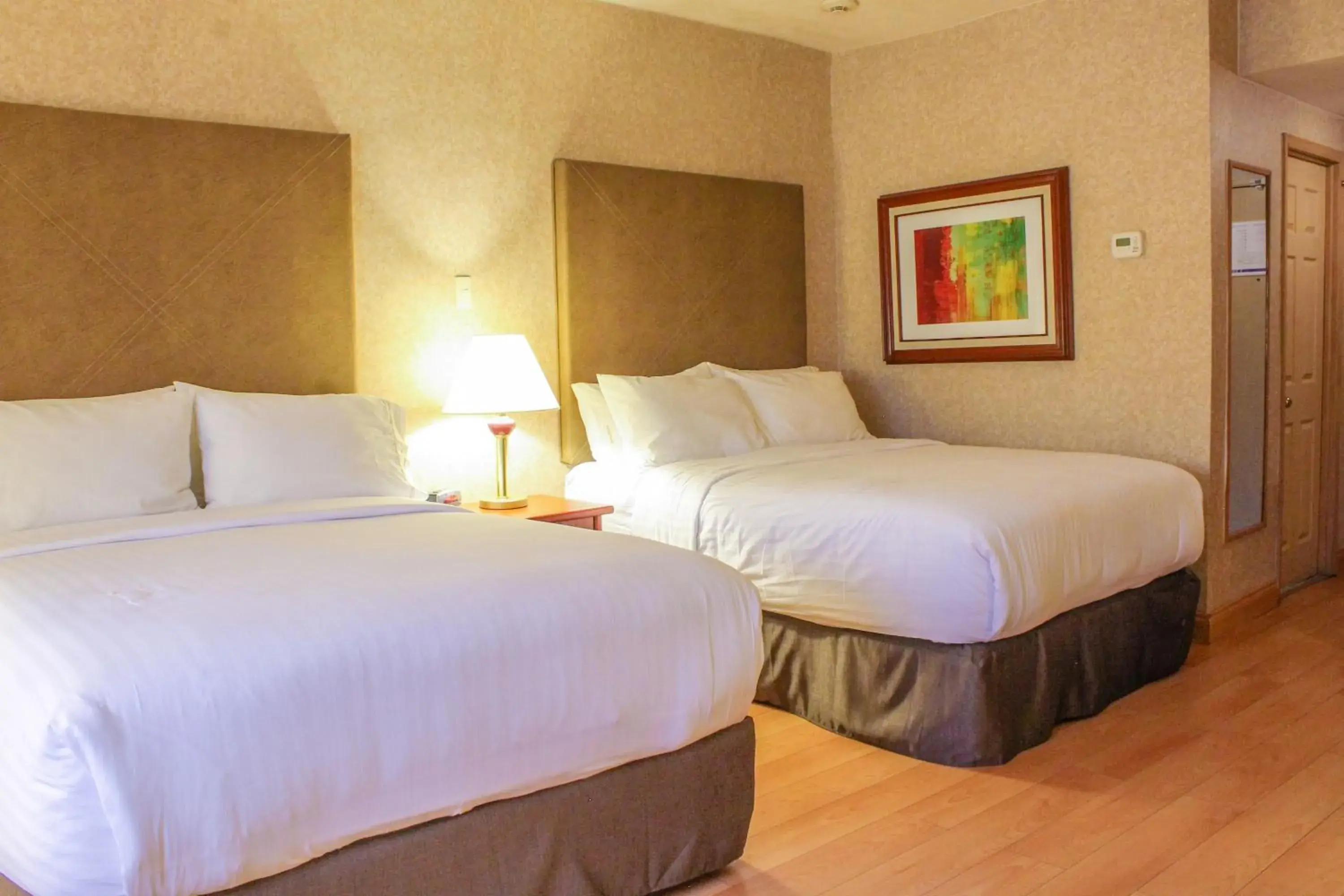 Bed in Holiday Inn Express Chihuahua by IHG Bed in Holiday Inn Express Chihuahua by IHG