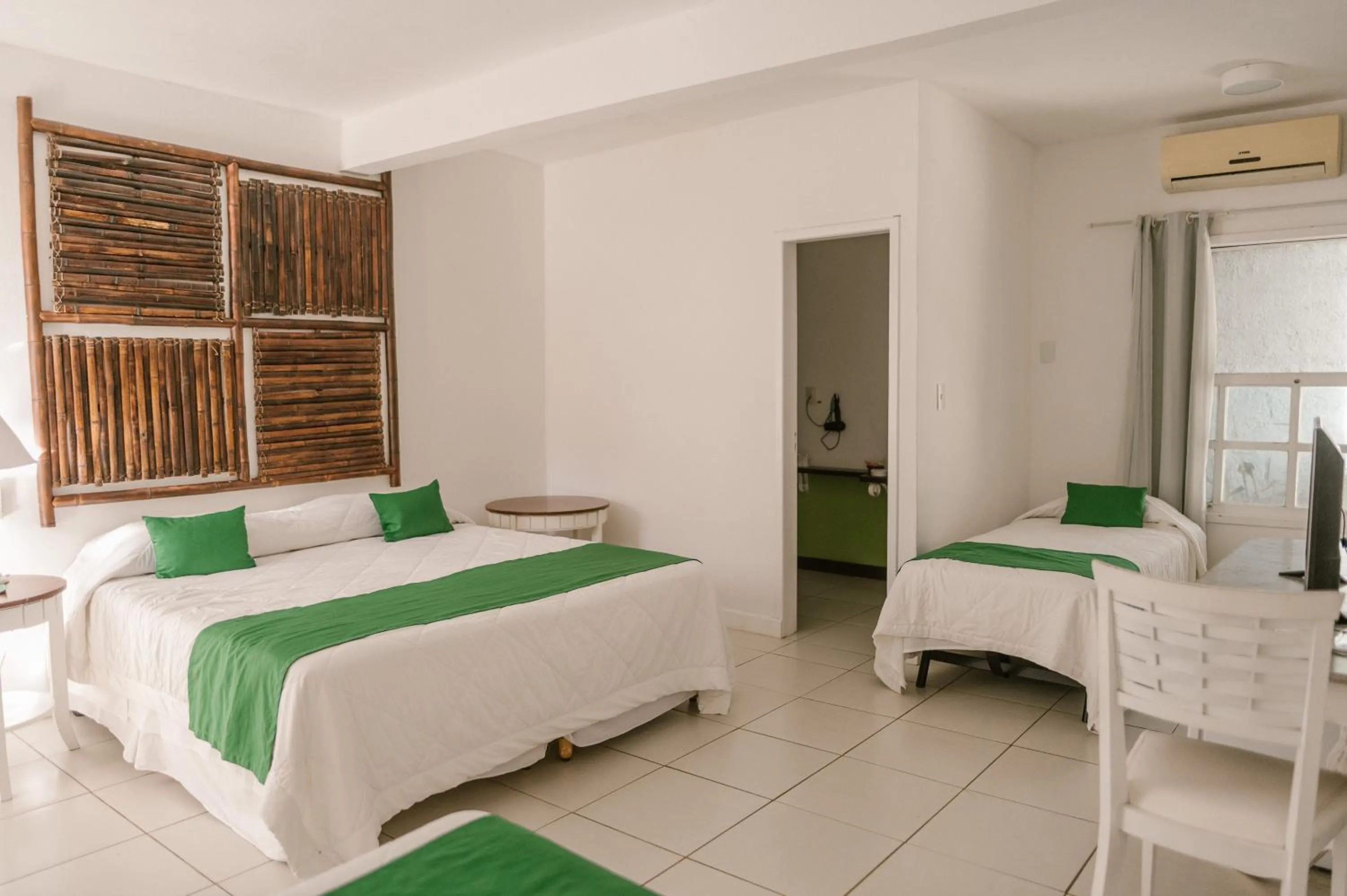 Bed in Pousada Bucaneiro