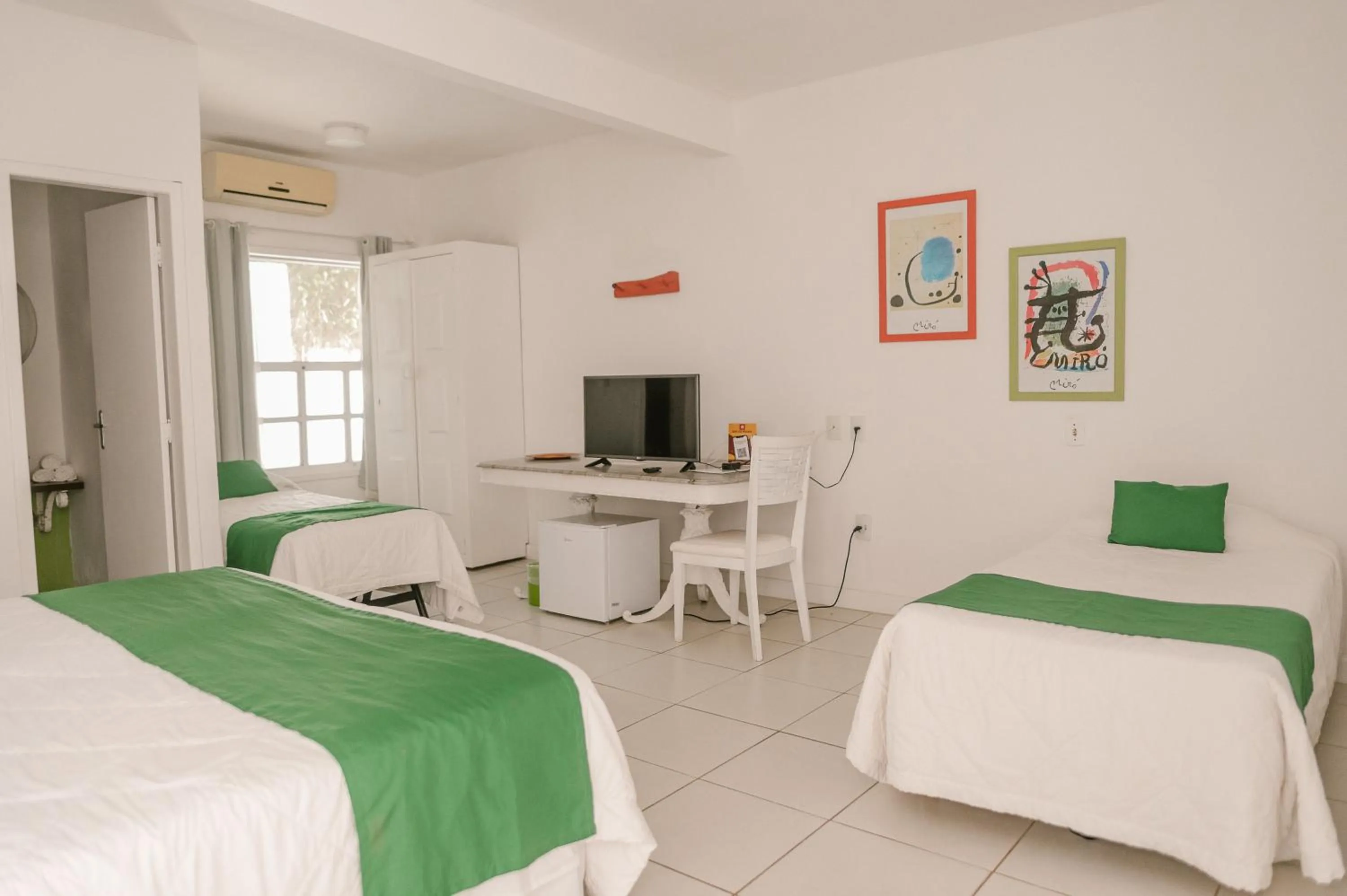 Bed in Pousada Bucaneiro