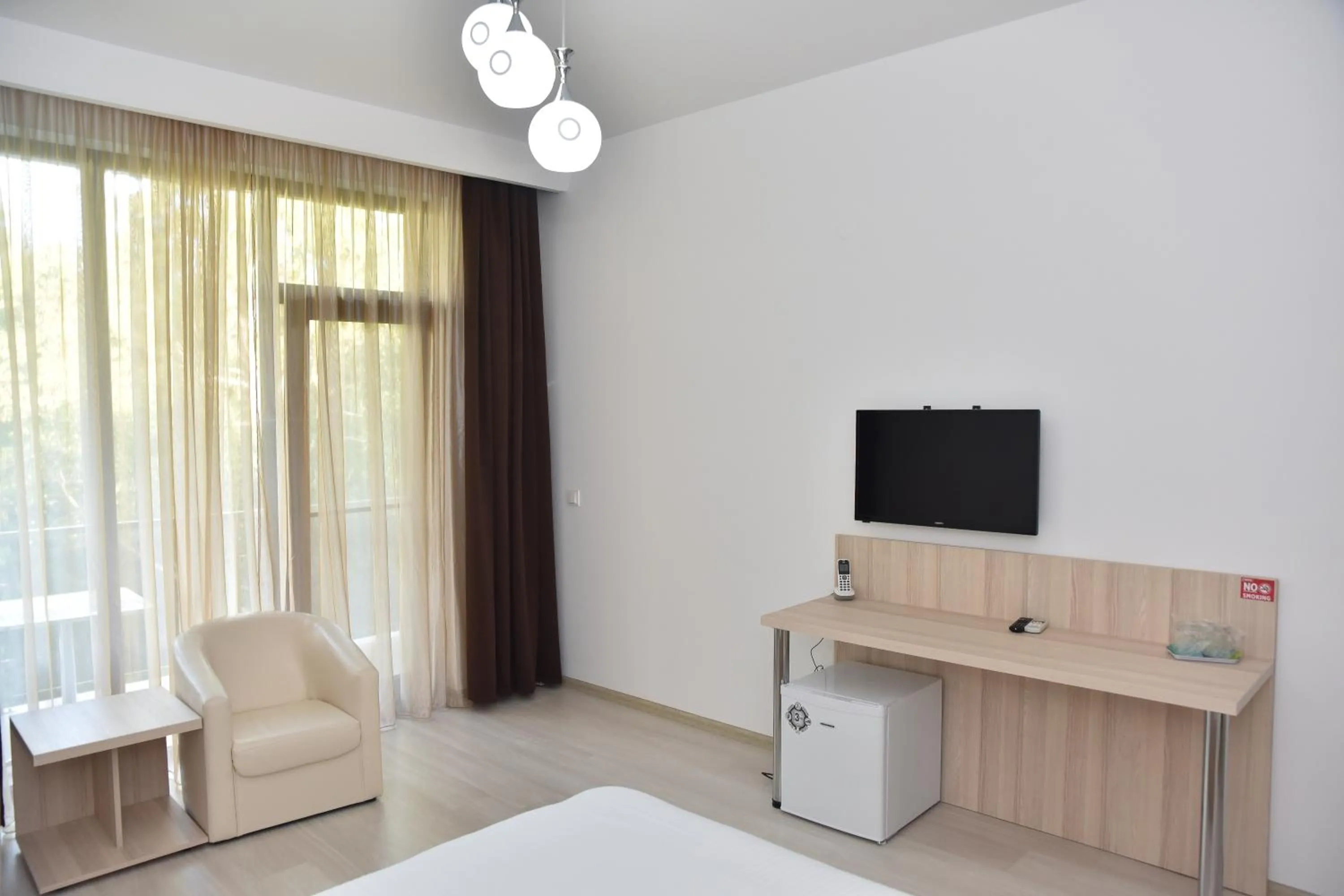 Bedroom, Bed in Q Hotel