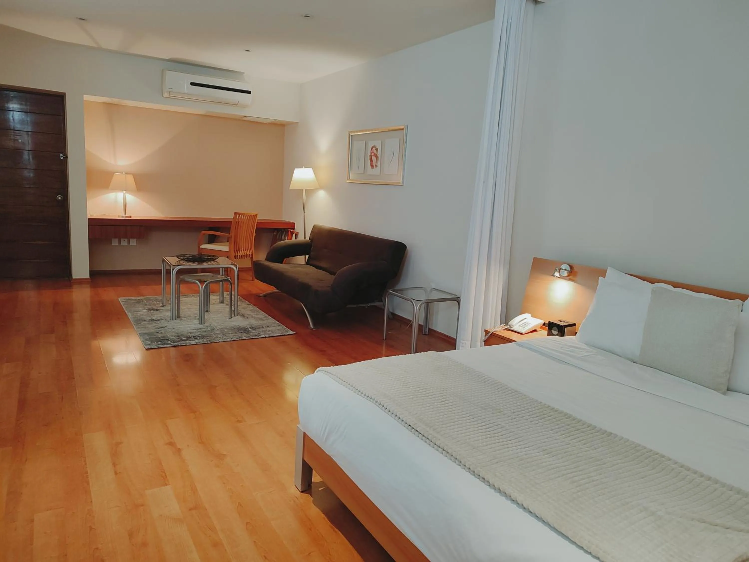 Bed in Lombardo Suites