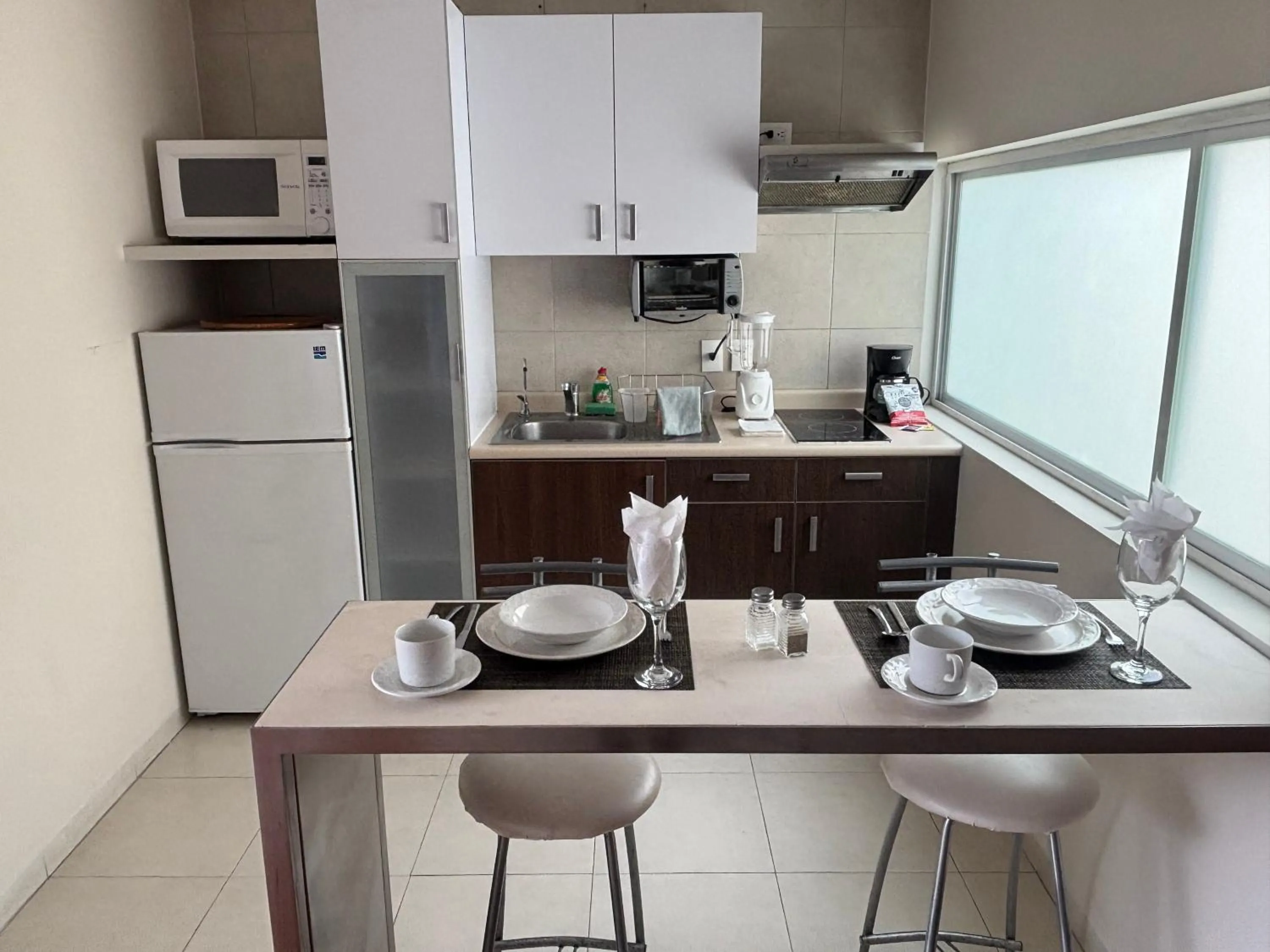 kitchen in Lombardo Suites