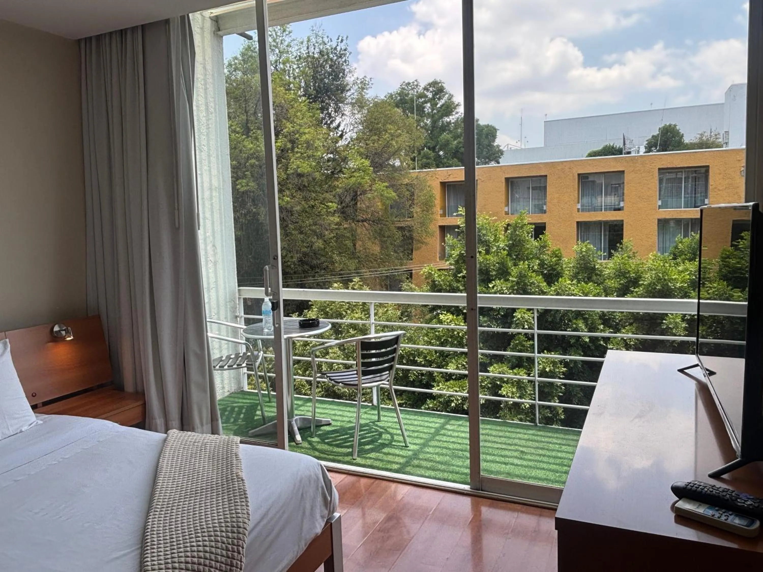 Balcony/Terrace, Bed in Lombardo Suites