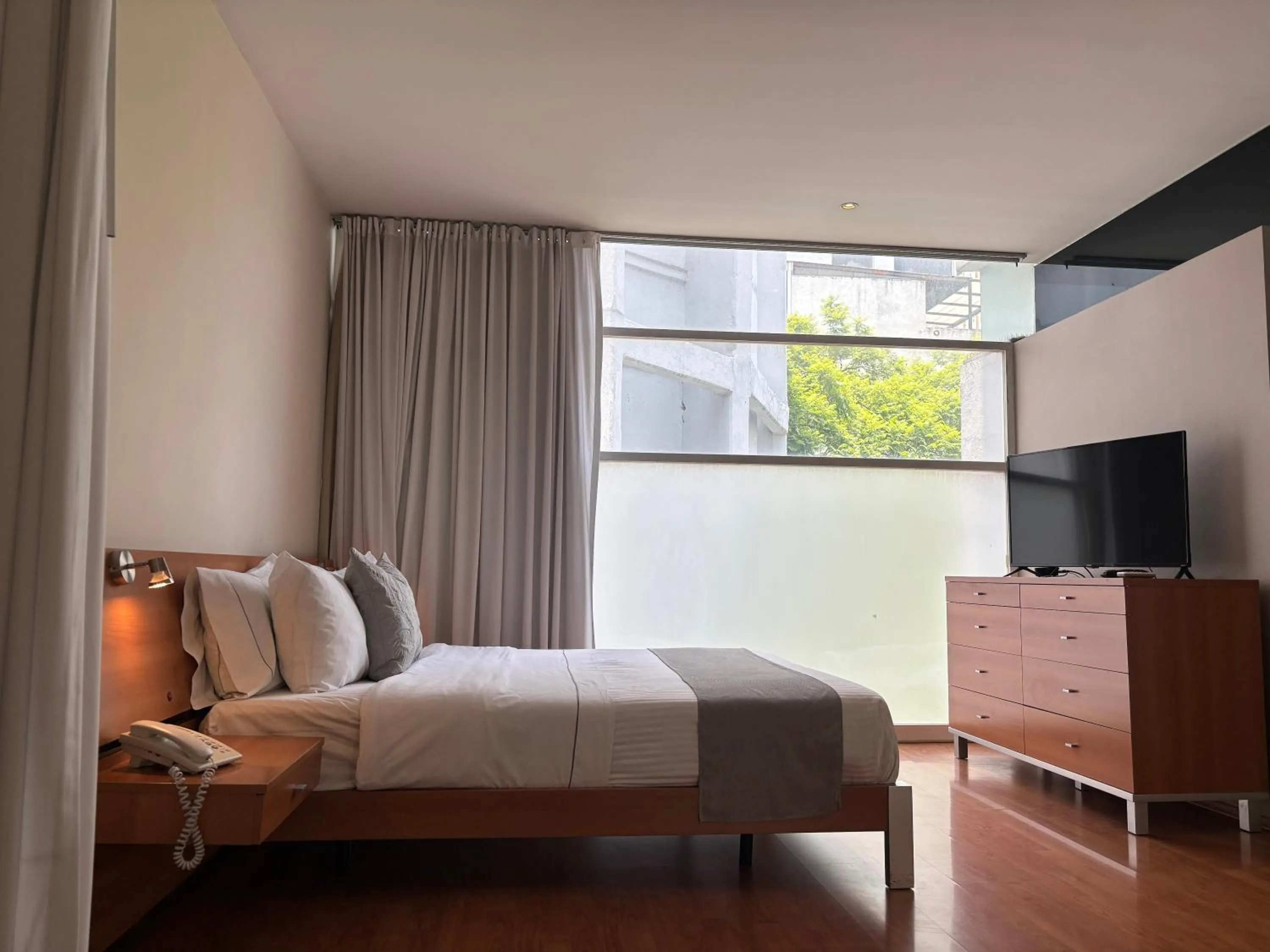 Bed in Lombardo Suites