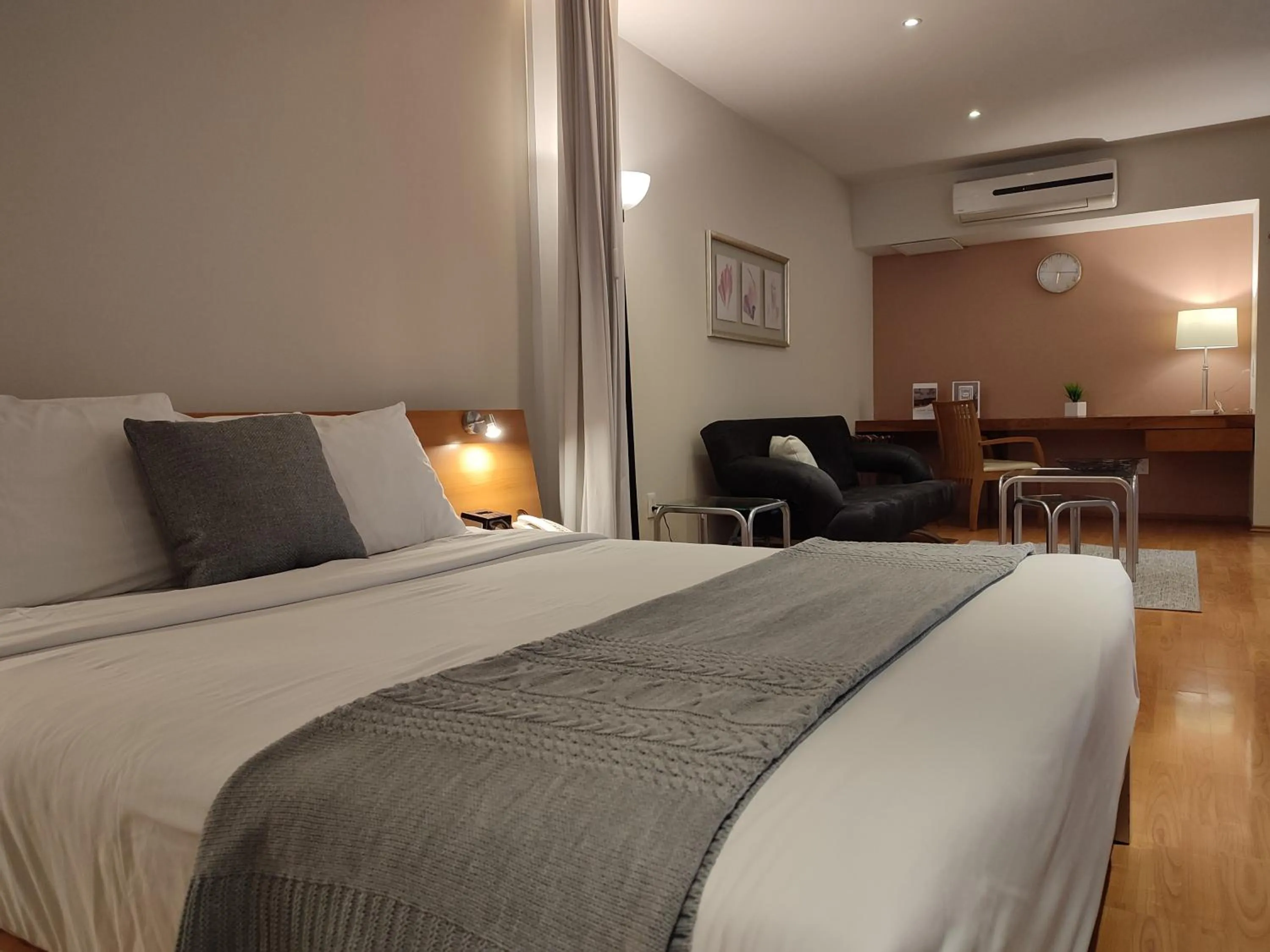 Bed in Lombardo Suites