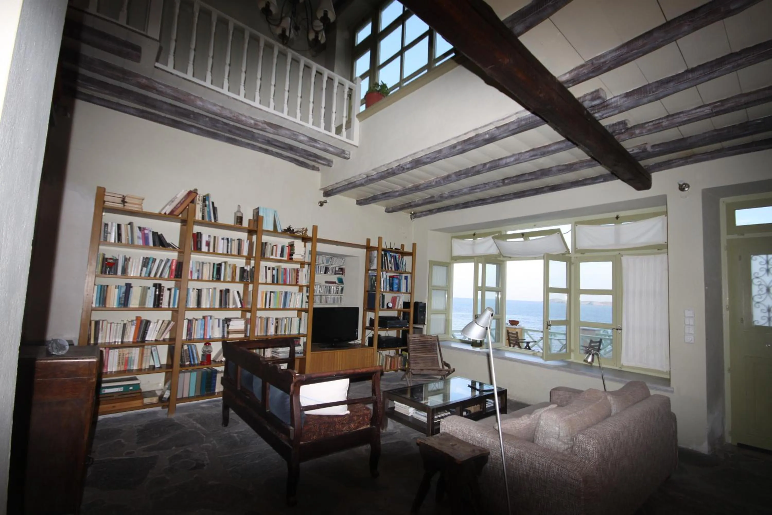 Library in Apollonos Seafront Apartment