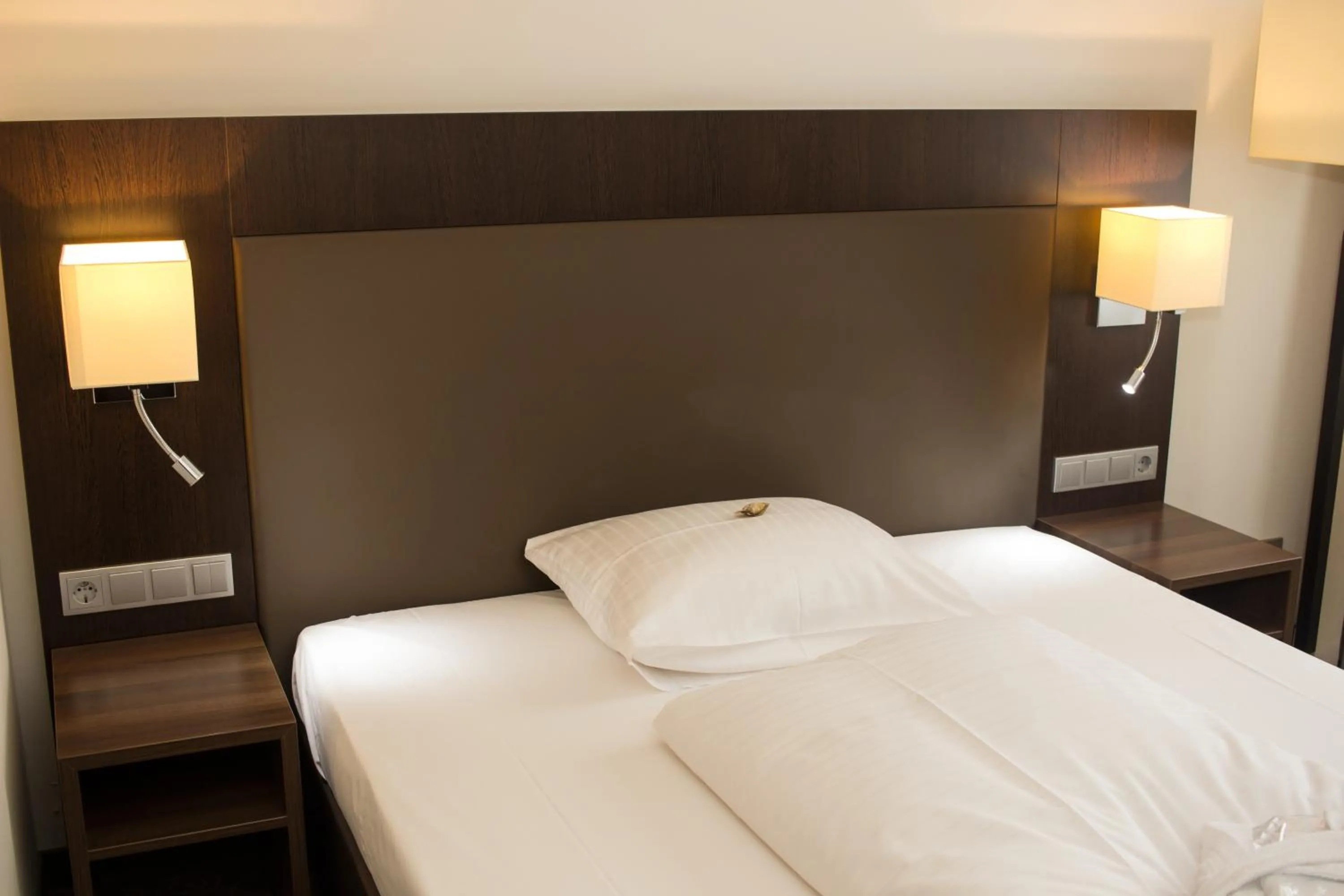 Bed in AVITAL Resort