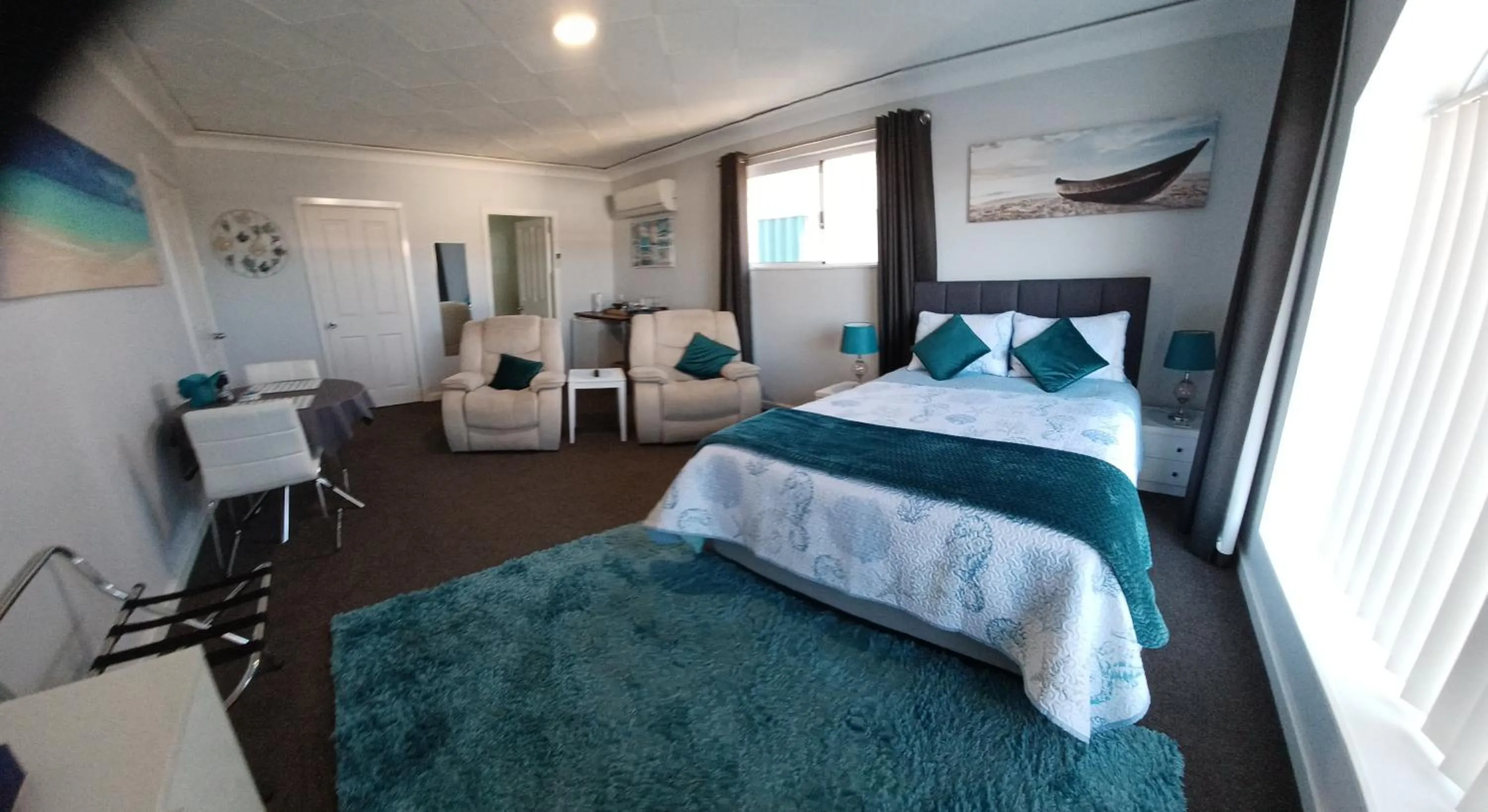 Bed in Palm Beach Guest House