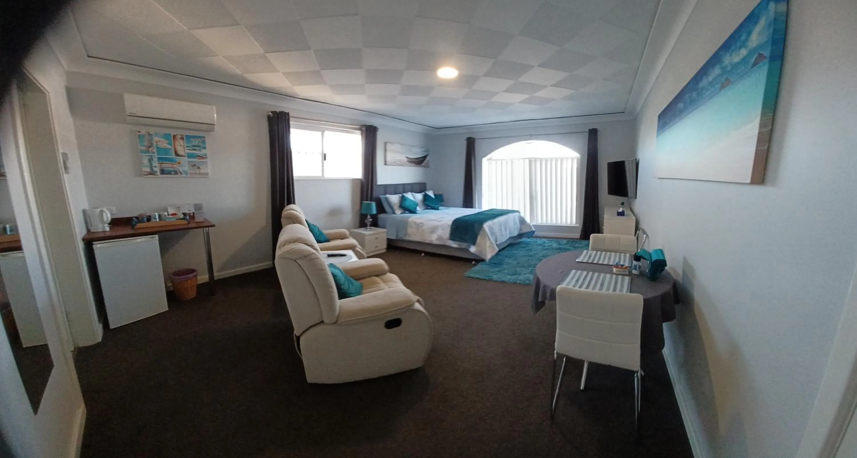 Bed in Palm Beach Guest House