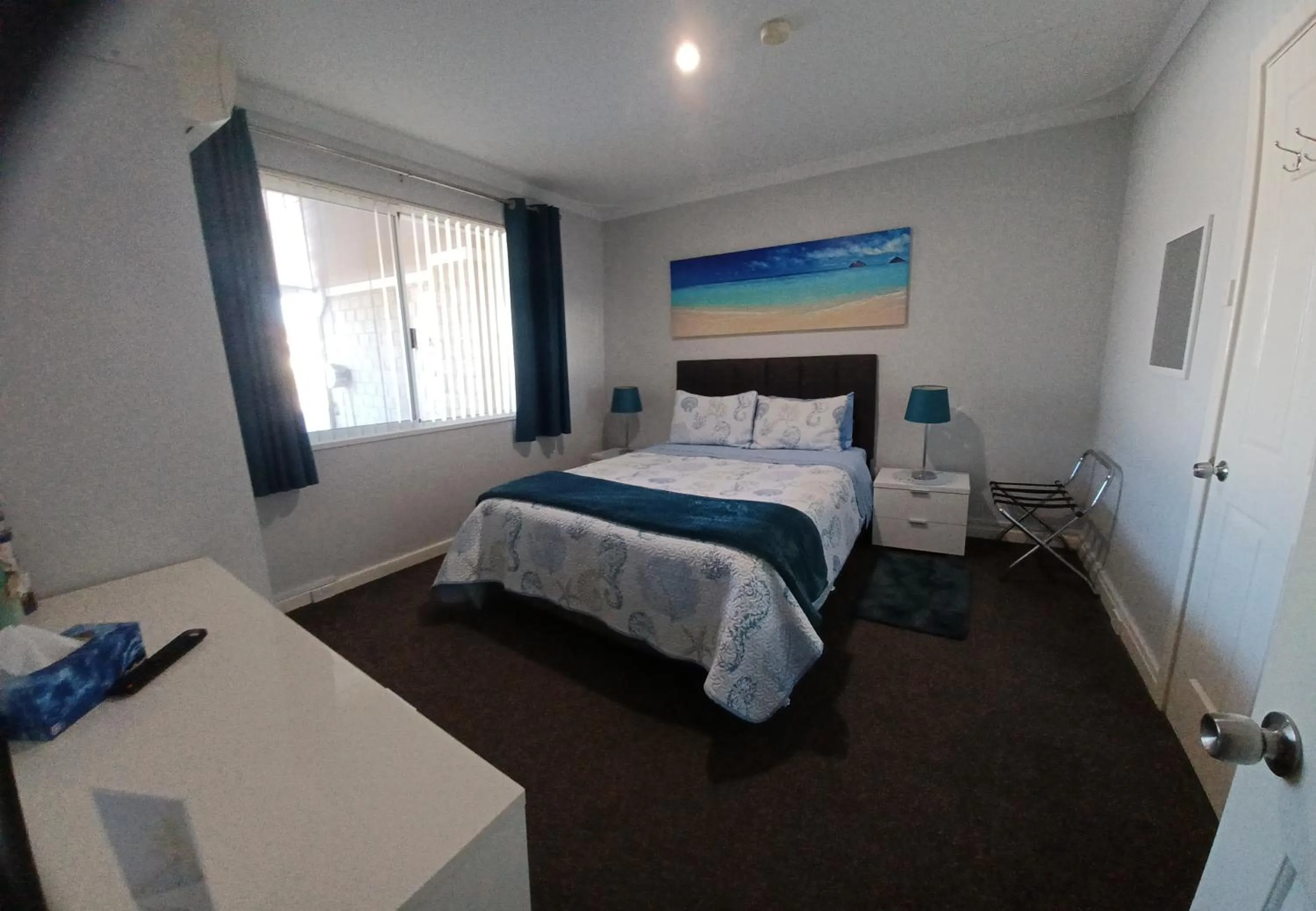 Bed in Palm Beach Guest House