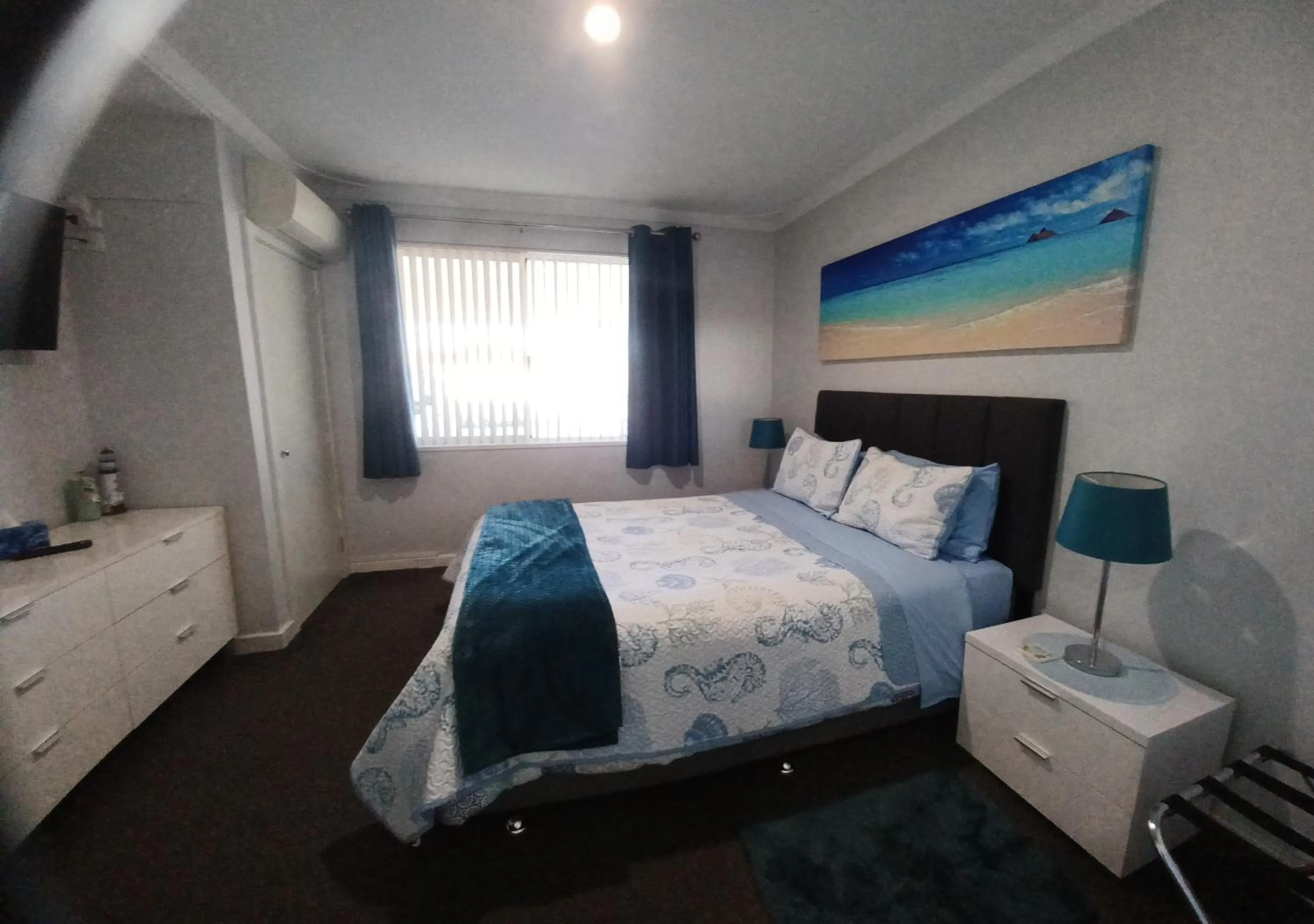 Bed in Palm Beach Guest House