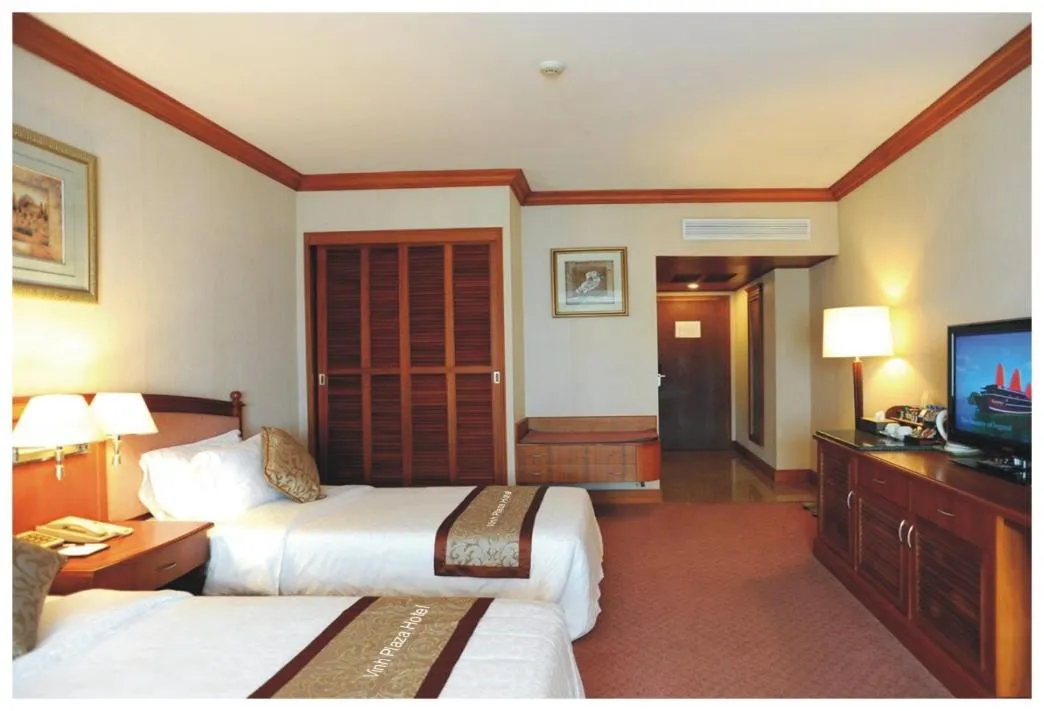 Bed in Vinh Plaza Hotel