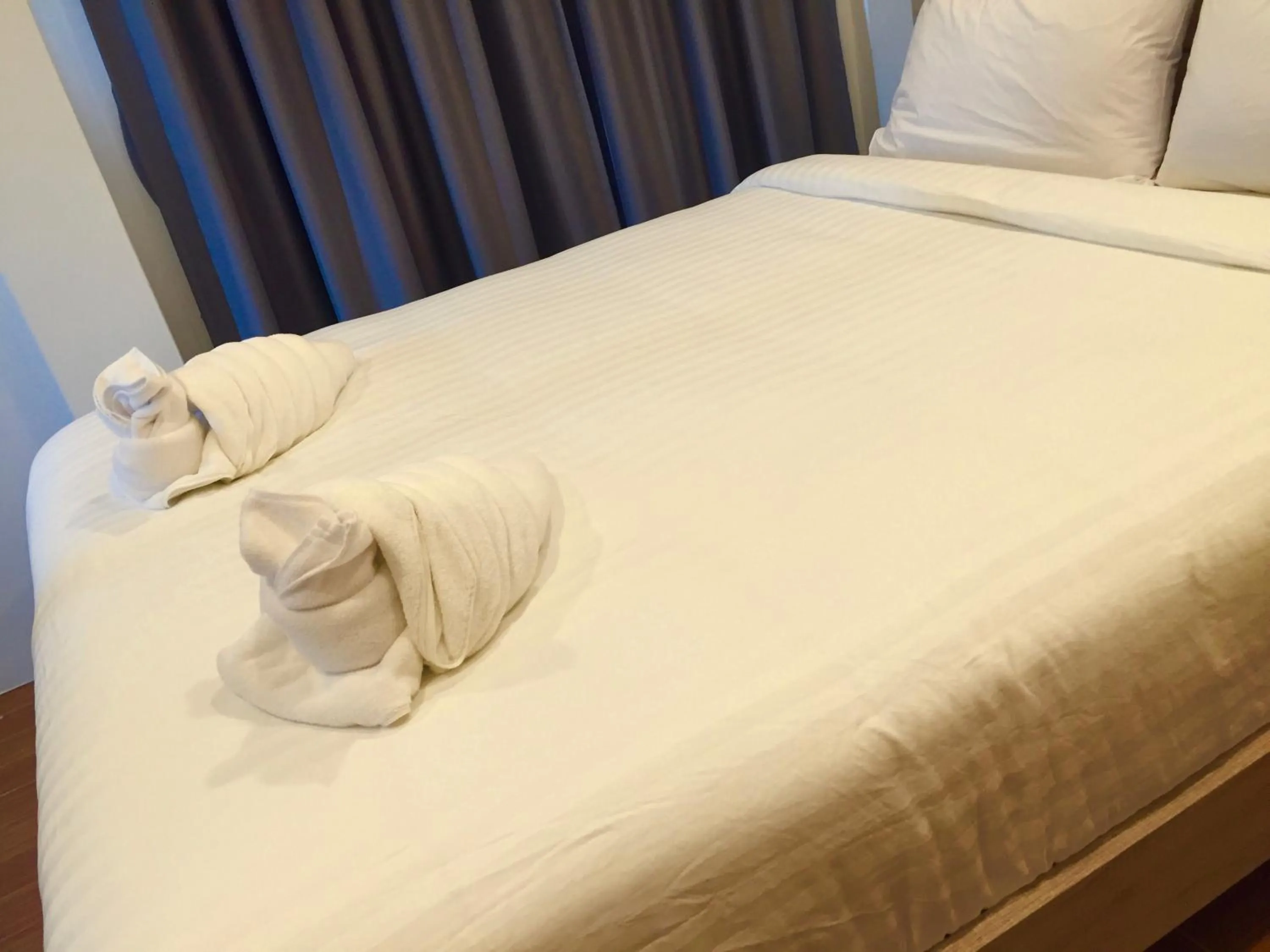 Bed in Mondara Vacation Home