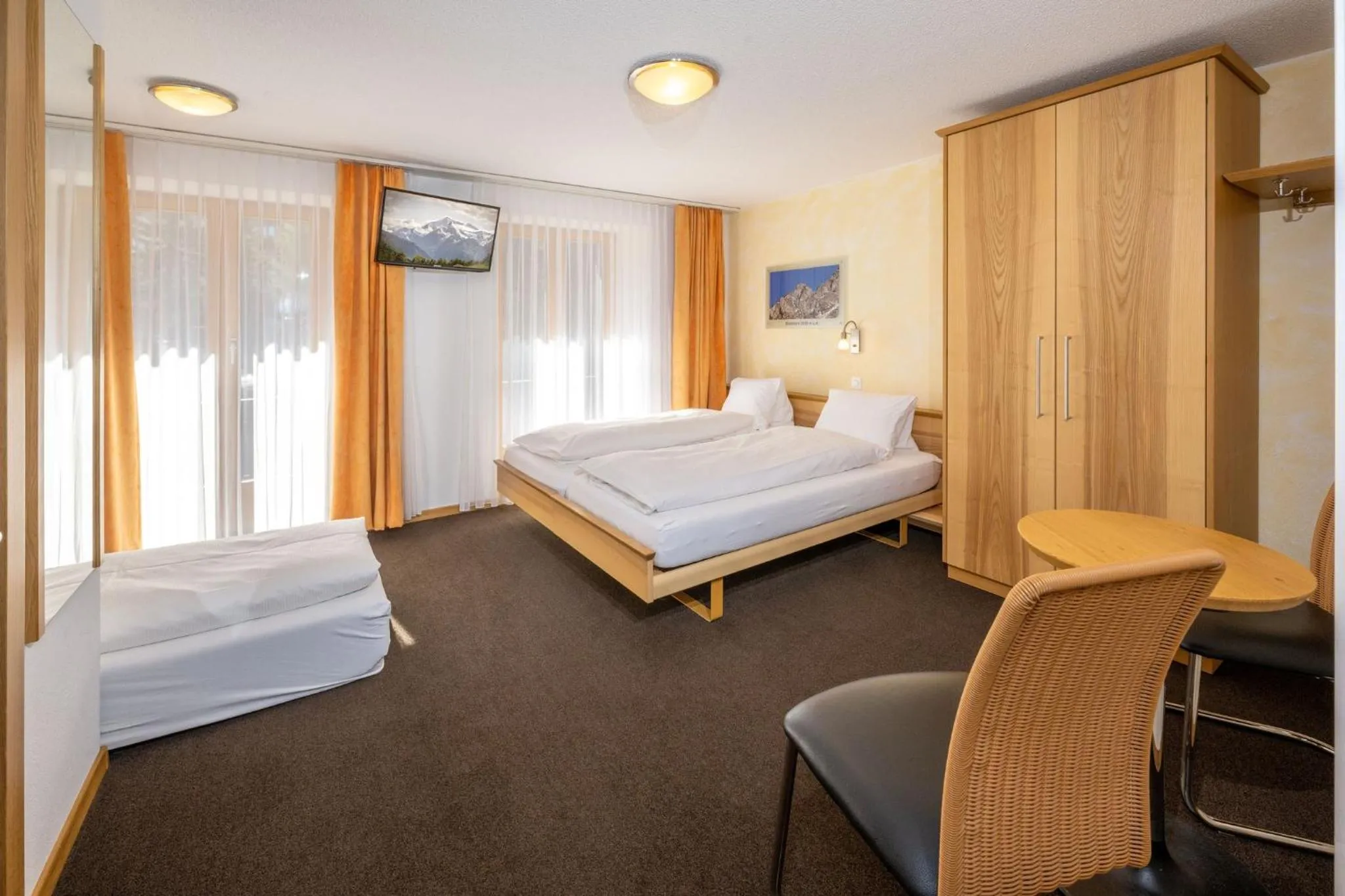 Photo of the whole room, Bed in Aktiv Hotel & Spa Hannigalp