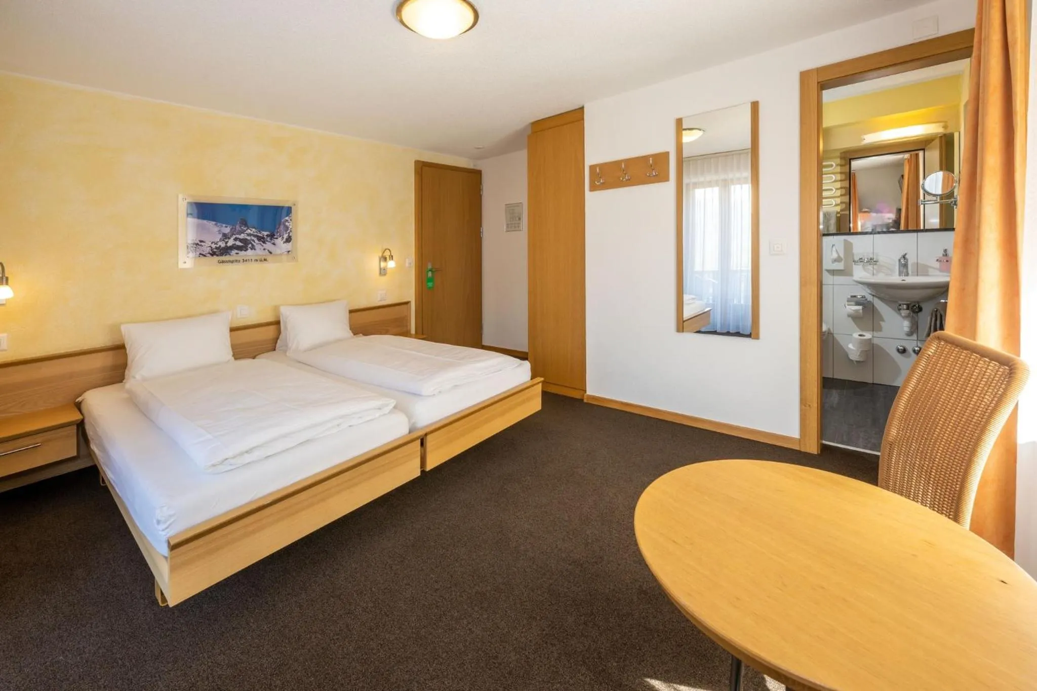 Photo of the whole room, Bed in Aktiv Hotel & Spa Hannigalp